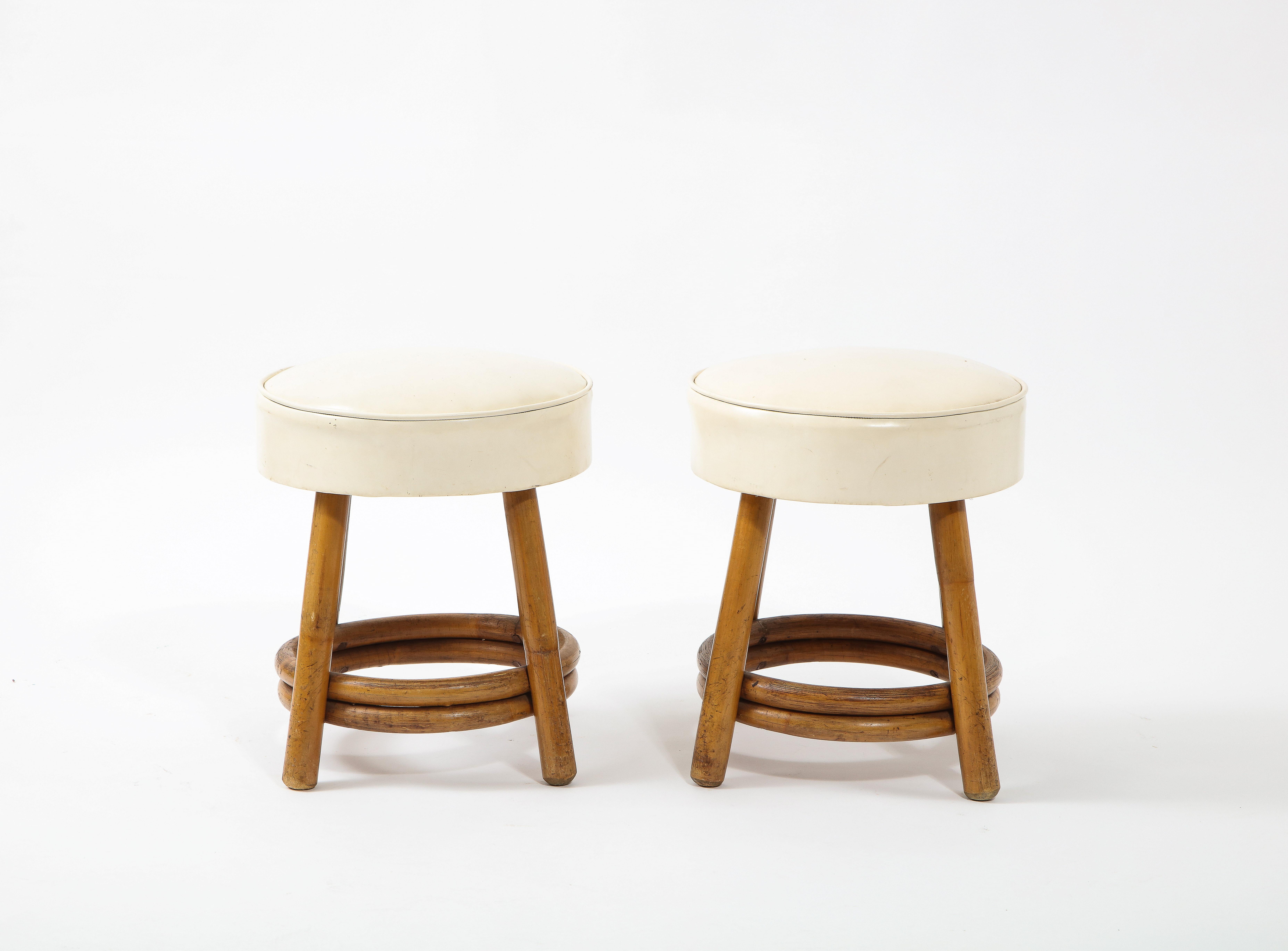 Pair of bamboo and vynil stools in the style of Paul Frankl. All original.