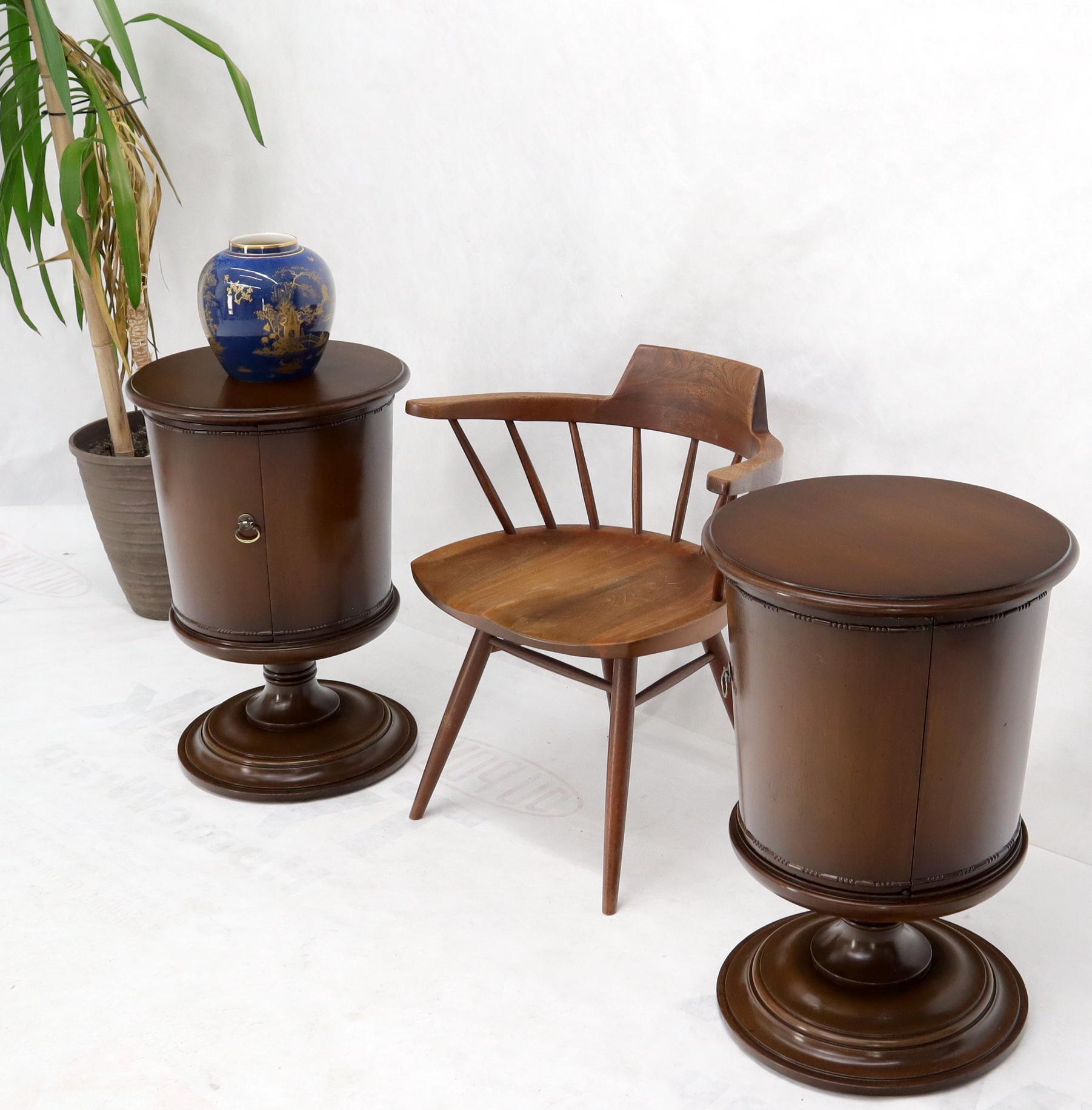 Pair of Hollywood Regency decorative round shape turned bases one door compartment end tables nightstands.
