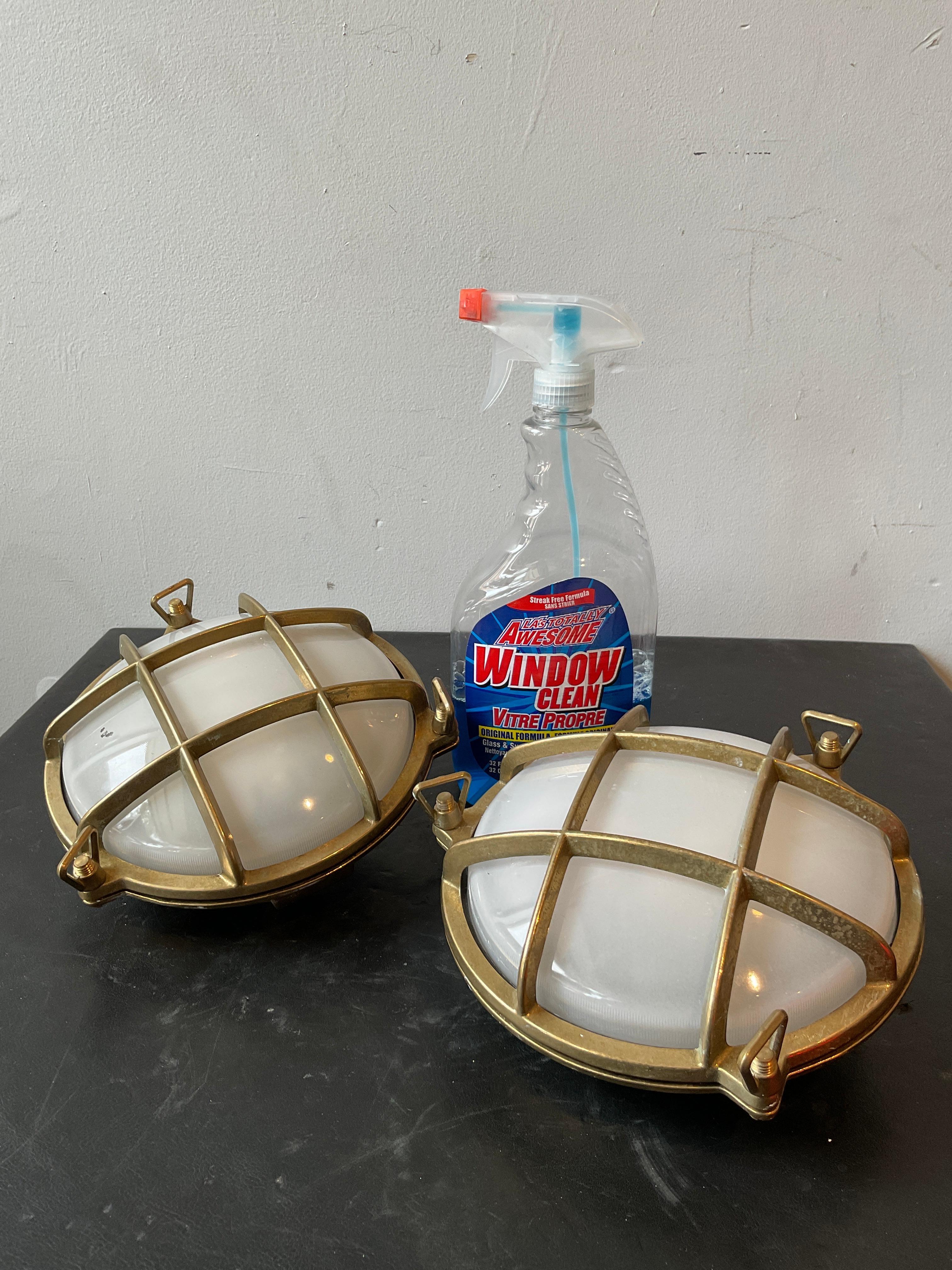 Pair of brass nautical sconces with white frosted glass. Some white finish has flaked off as shown in picture. Heavy brass.
Has original wiring, needs rewiring.