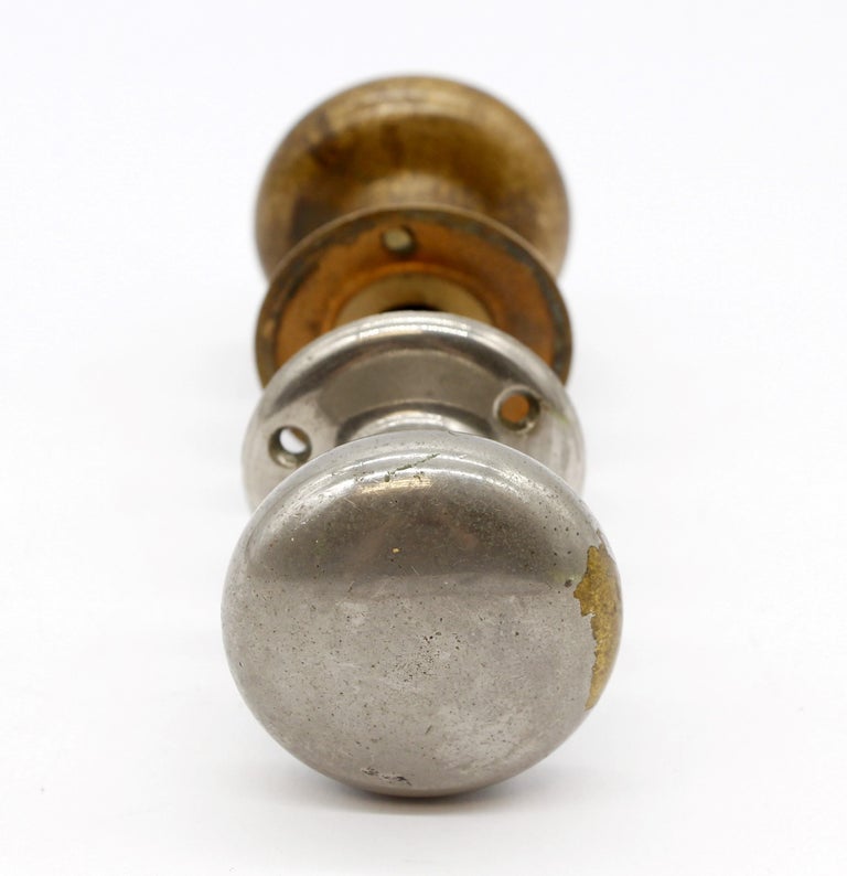 Pair of Round Brass and NickelPlated Door Knobs with Matching Rosettes Antique For Sale at