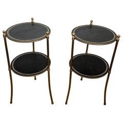 Pair of Round Brass side Tables with Black Leather Tops by Maison Jansen