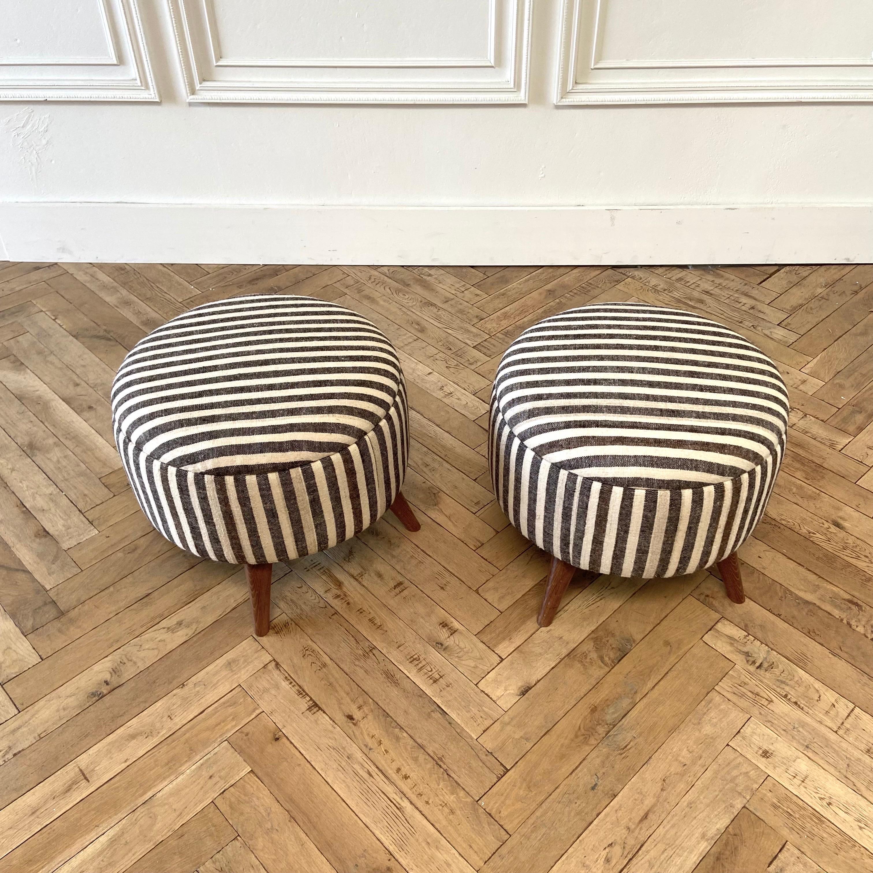 Custom made vintage Turkish rug round ottoman.
Once a stripe rug now a useful cocktail ottoman. one of a kind items.
These ottomans have been created from vintage textile rugs from Turkey.
Wood legs are in a walnut finish.
Sold as a set.
Size: