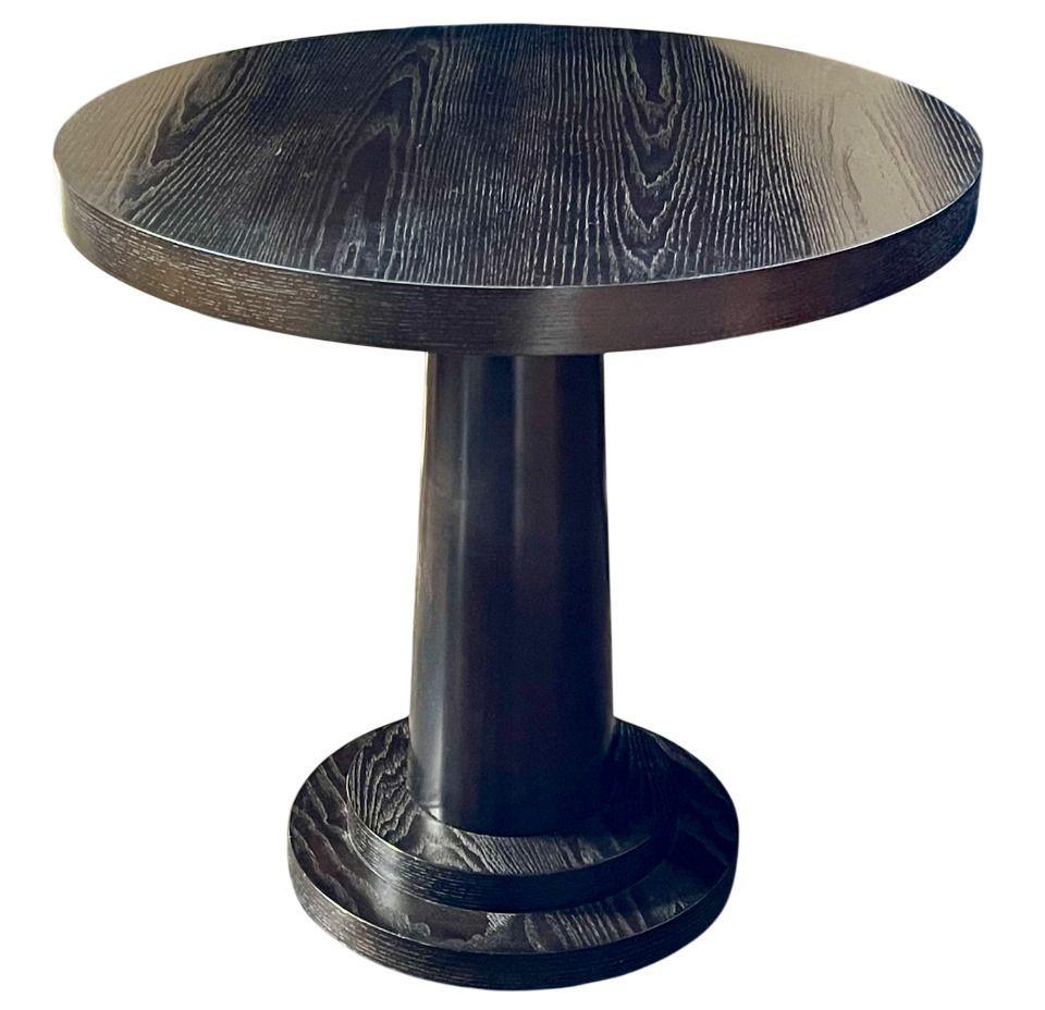A stylish pair of round end tables by the renowned Bernhardt Furniture Company, crafted in the USA in the late 20th century. These tables feature a clean, modern silhouette with a rich dark brown finish, offering a timeless and versatile addition to
