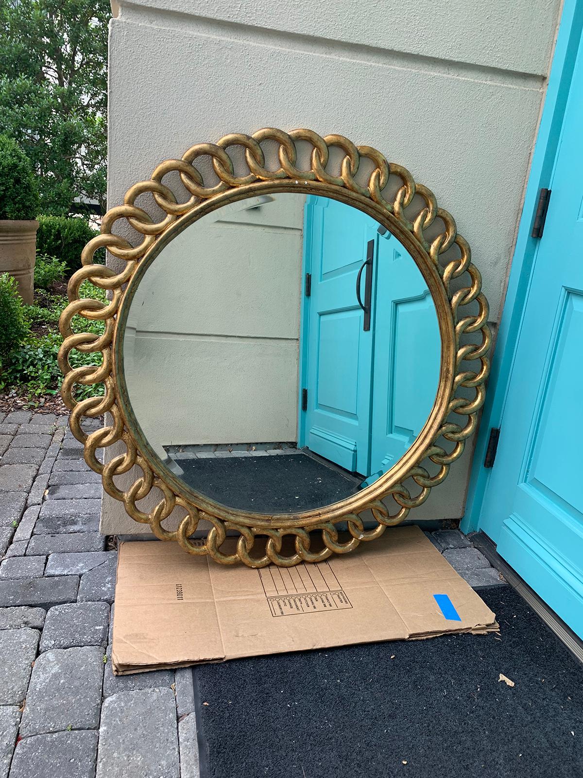 Pair of large round giltwood mirrors with interlocking circles, circa 1940s-1950s.