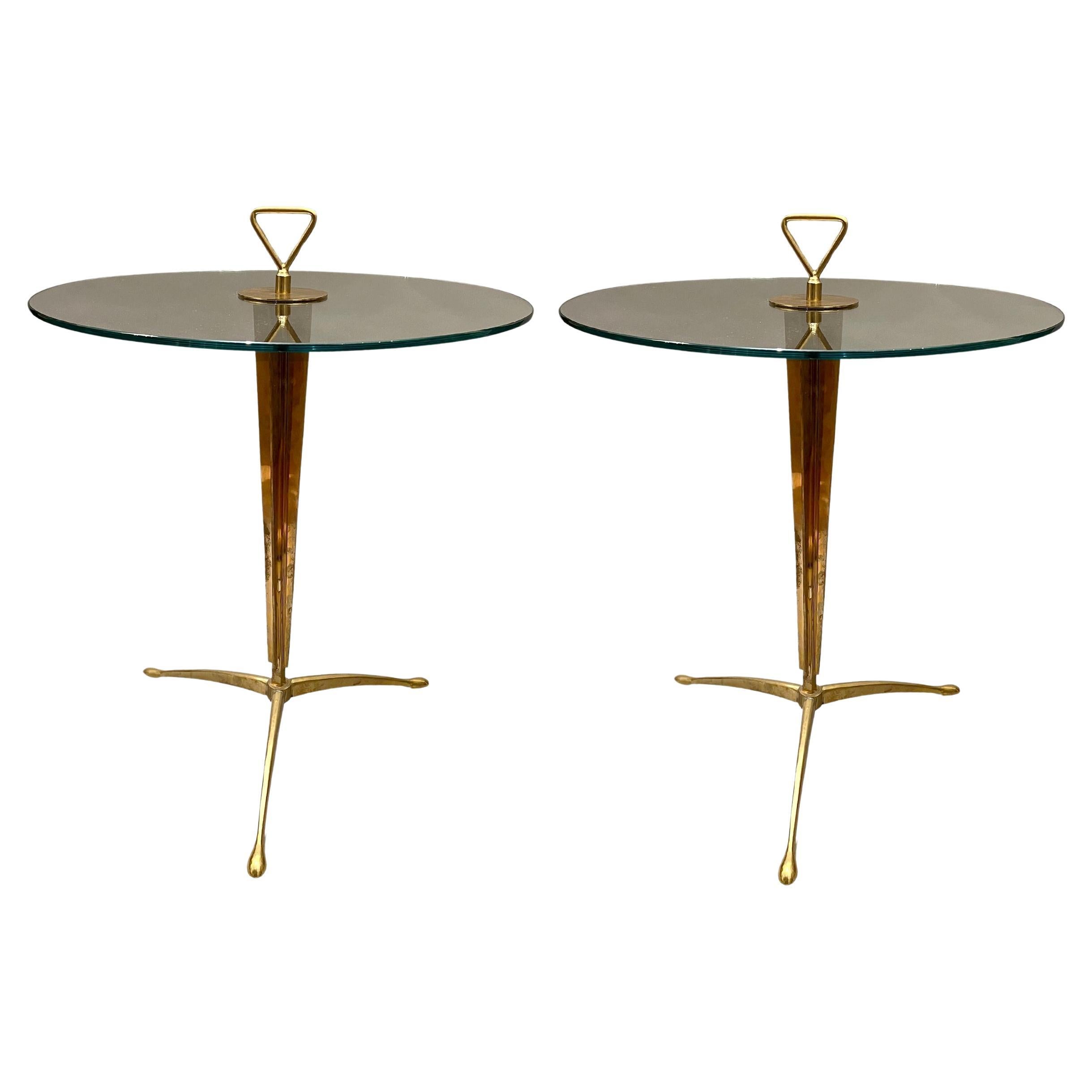Pair of round glass and brass pedestal tables, Italy, circa 1970 For Sale