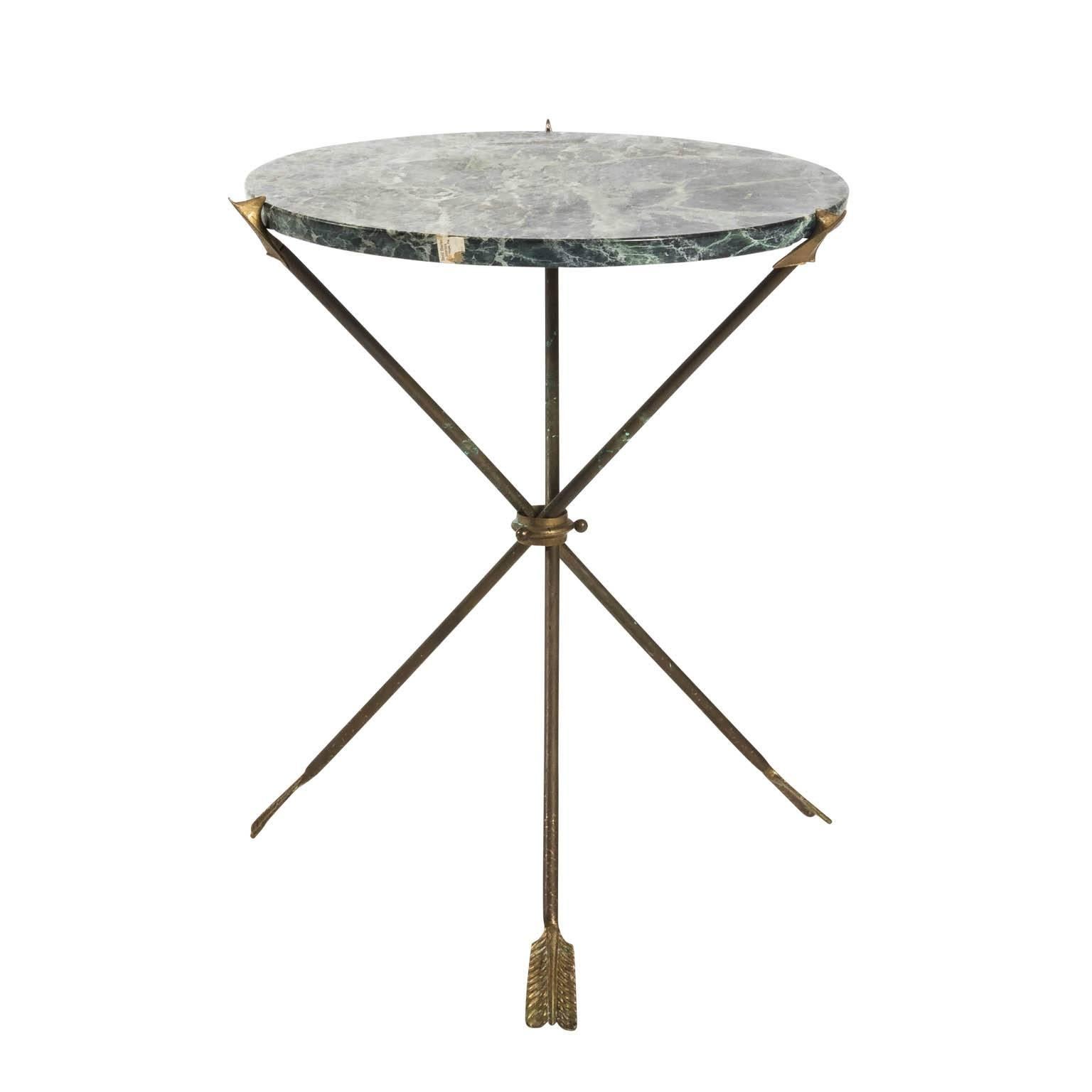 Mid-20th century side tables with round Verde Luna marble tops on a brass arrow shaped tripod bases in a manner of French Directoire style.
 