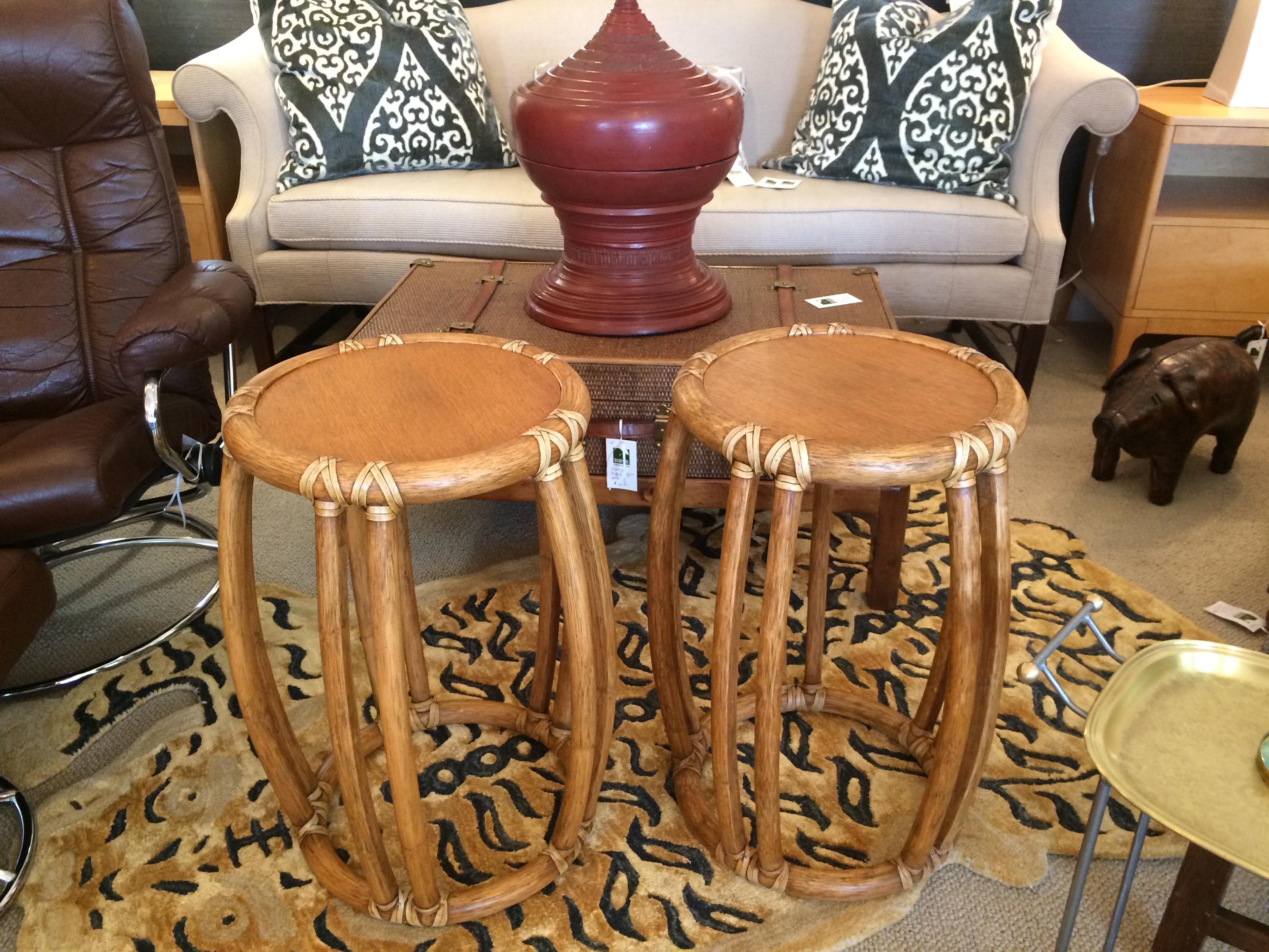 Two handsome rattan tall round side tables by McGuire.