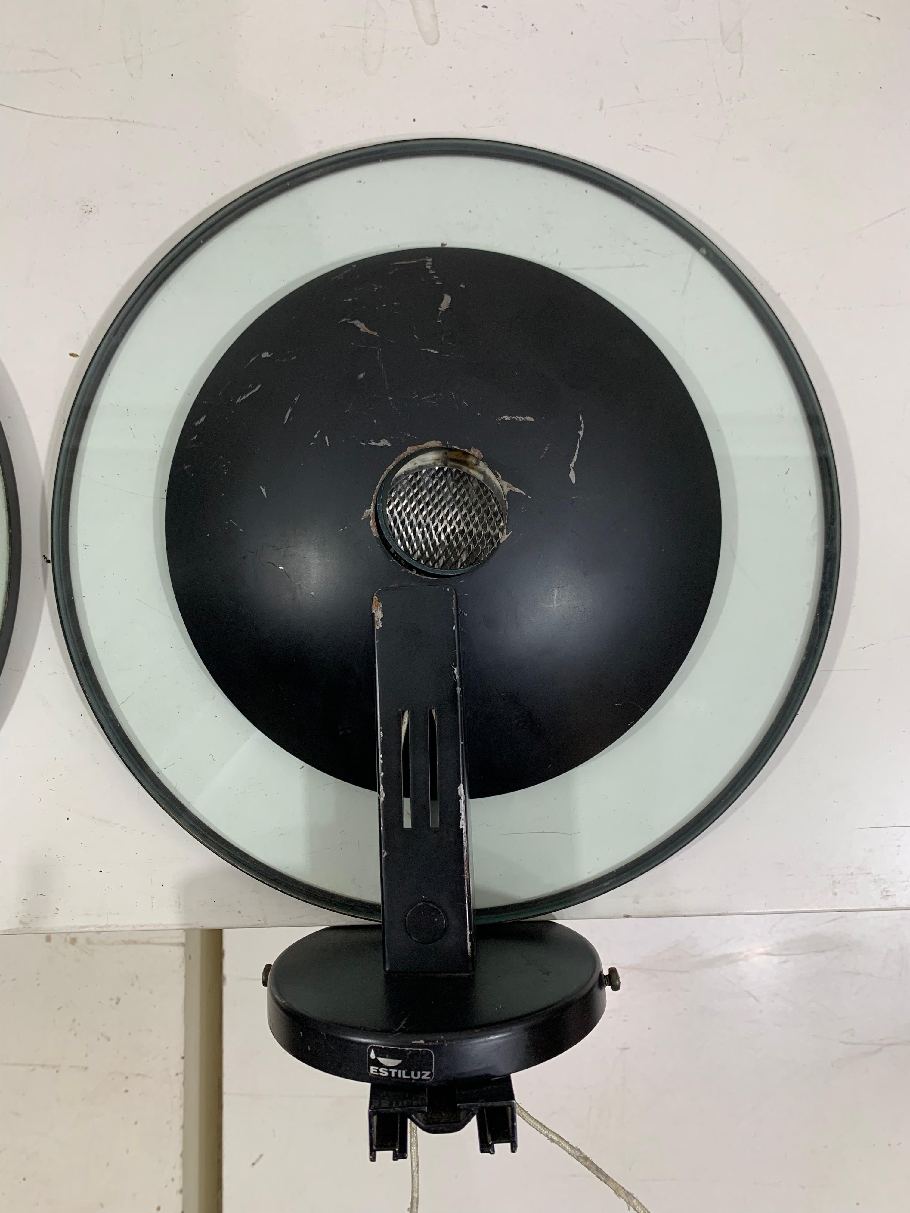 Pair of round metal black wall sconces by Etiluz In Good Condition For Sale In Beirut, LB
