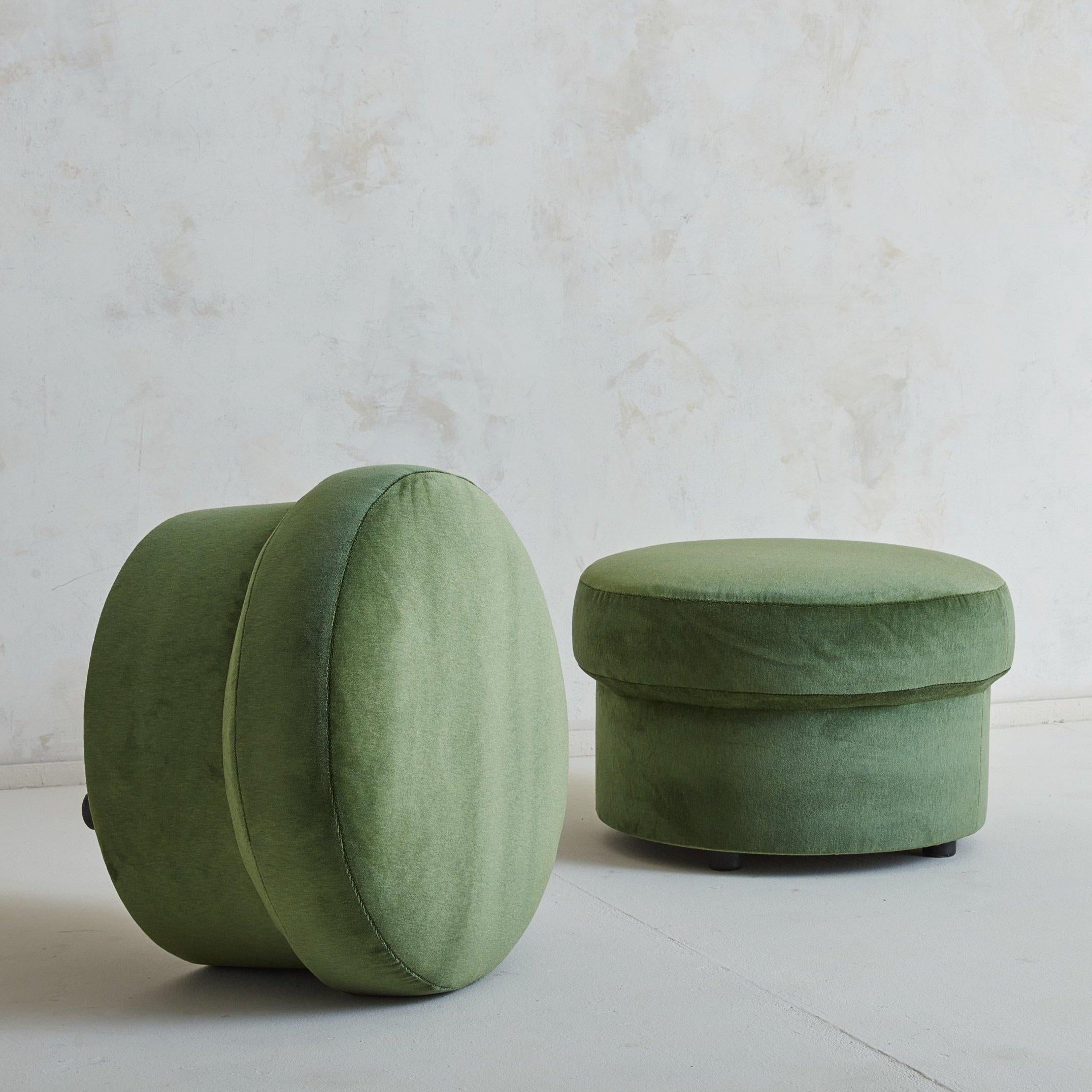 A charming pair of vintage ottomans sourced in the South of France. These have been professionally restored in a beautiful green velvet. 
 

 DIMENSIONS: 24.5