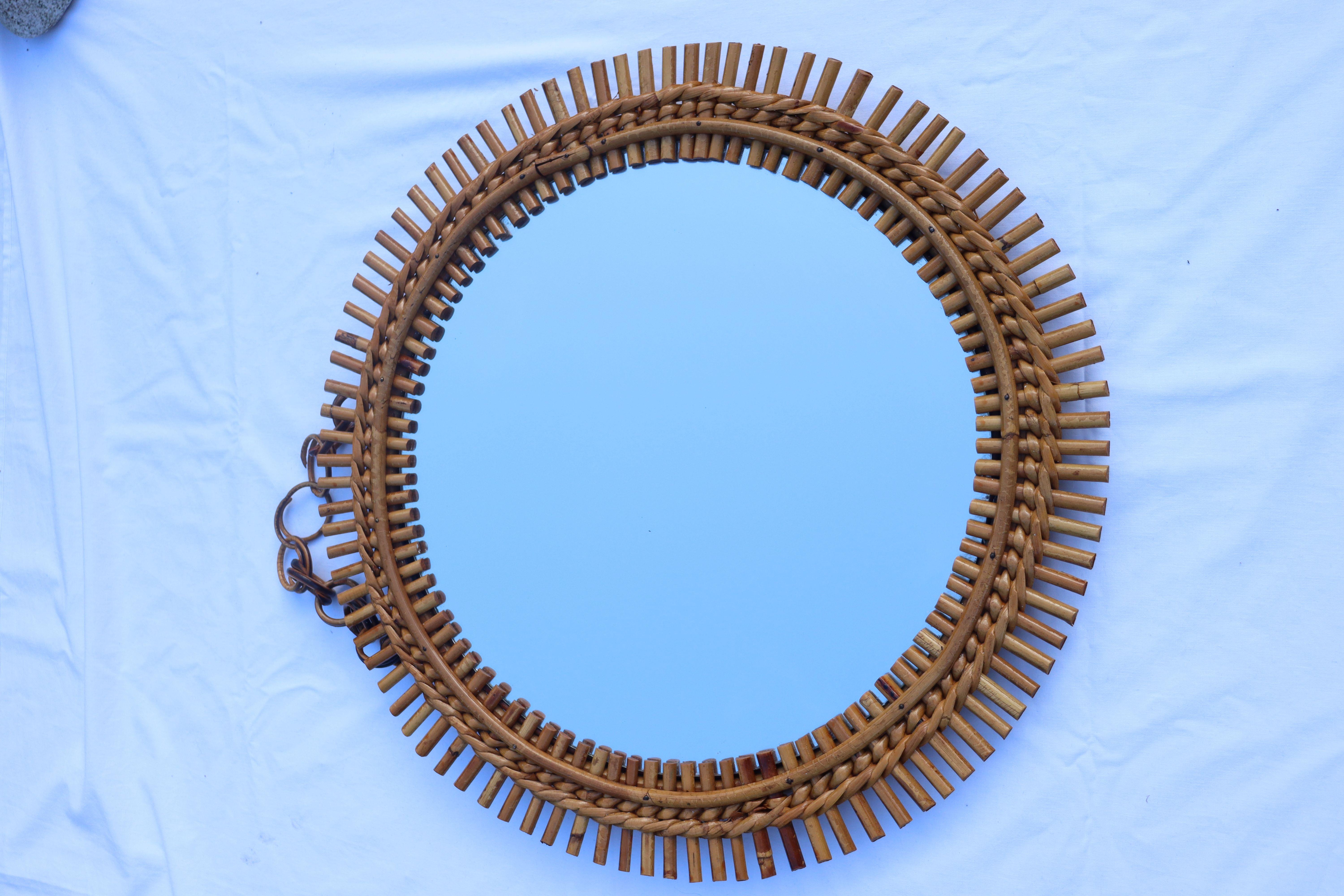 pair of round mirrors in rattan and bamboo by designer Franco Albini published by Bonacina from the 60s, in very good condition