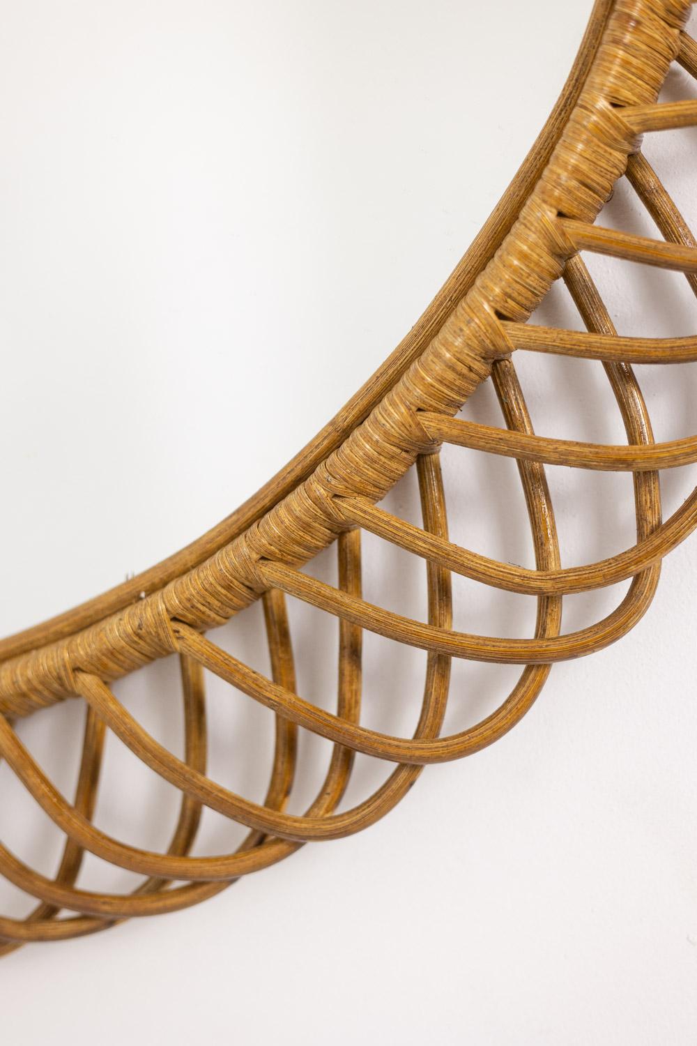 Pair of round rattan mirrors with interlacing. 1980s. In Excellent Condition For Sale In Saint-Ouen, FR