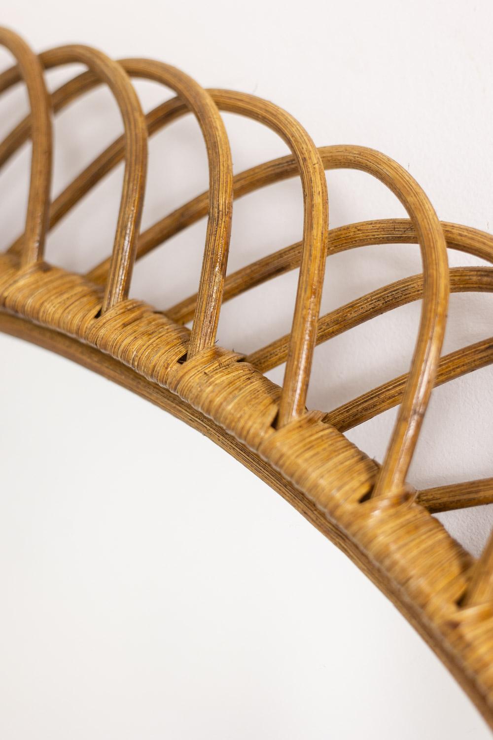 Rattan Pair of round rattan mirrors with interlacing. 1980s. For Sale
