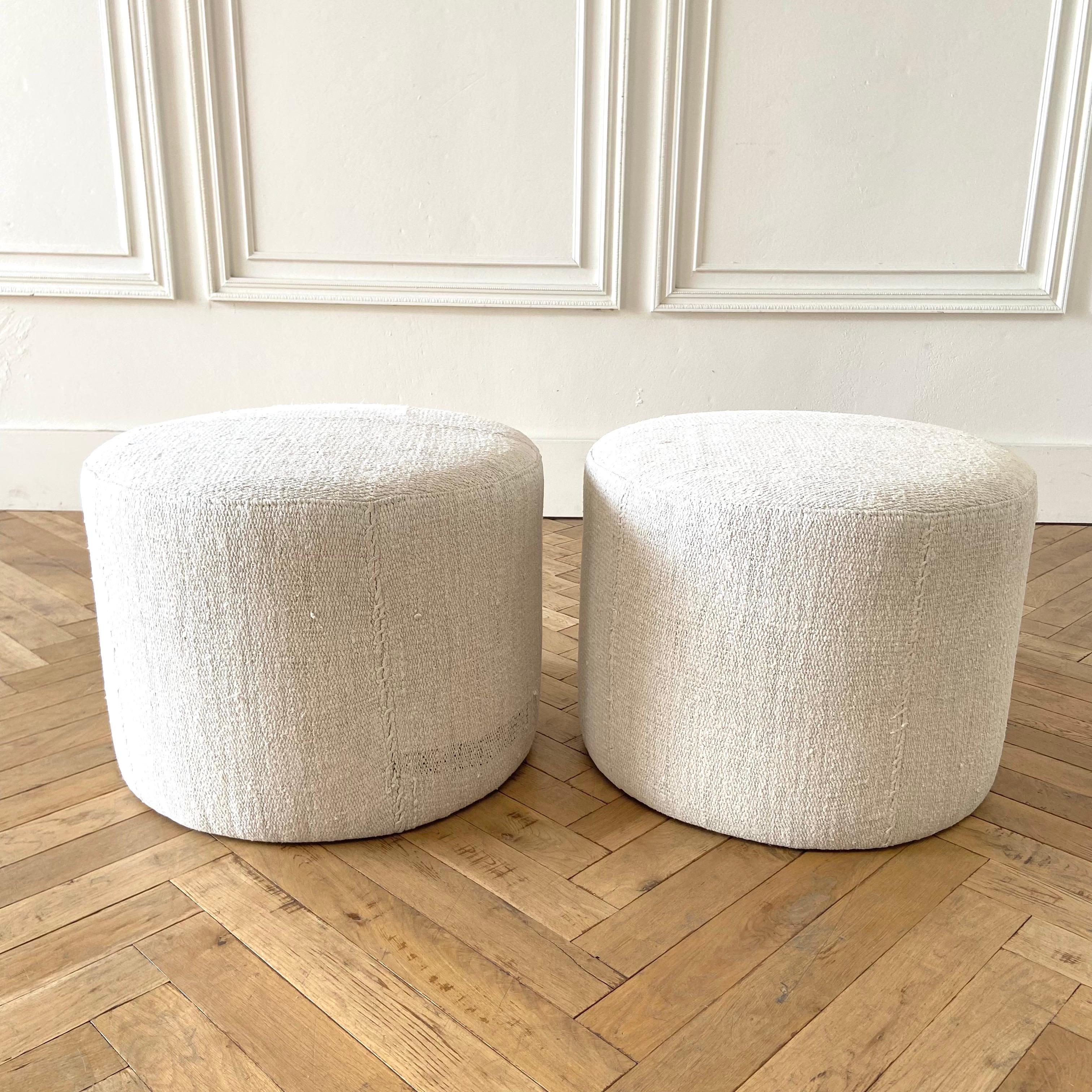 Pair of round hemp ottomans 21” rd. X 16”h
Custom made round ottoman stools 
Size: 21