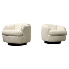 Pair of Rounded Swivel Lounge Chairs by Selig