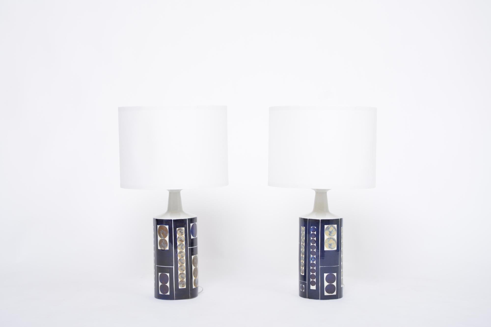 Pair of Royal 7 Midcentury Table Lamps by Ingelise Koefoed for Fog & Mørup
Tall and impressive table lamps with very decorative bold design by Danish artist Inge-Lise Koefoed. The lamp was produced in collaboration of Royal Copenhagen with the