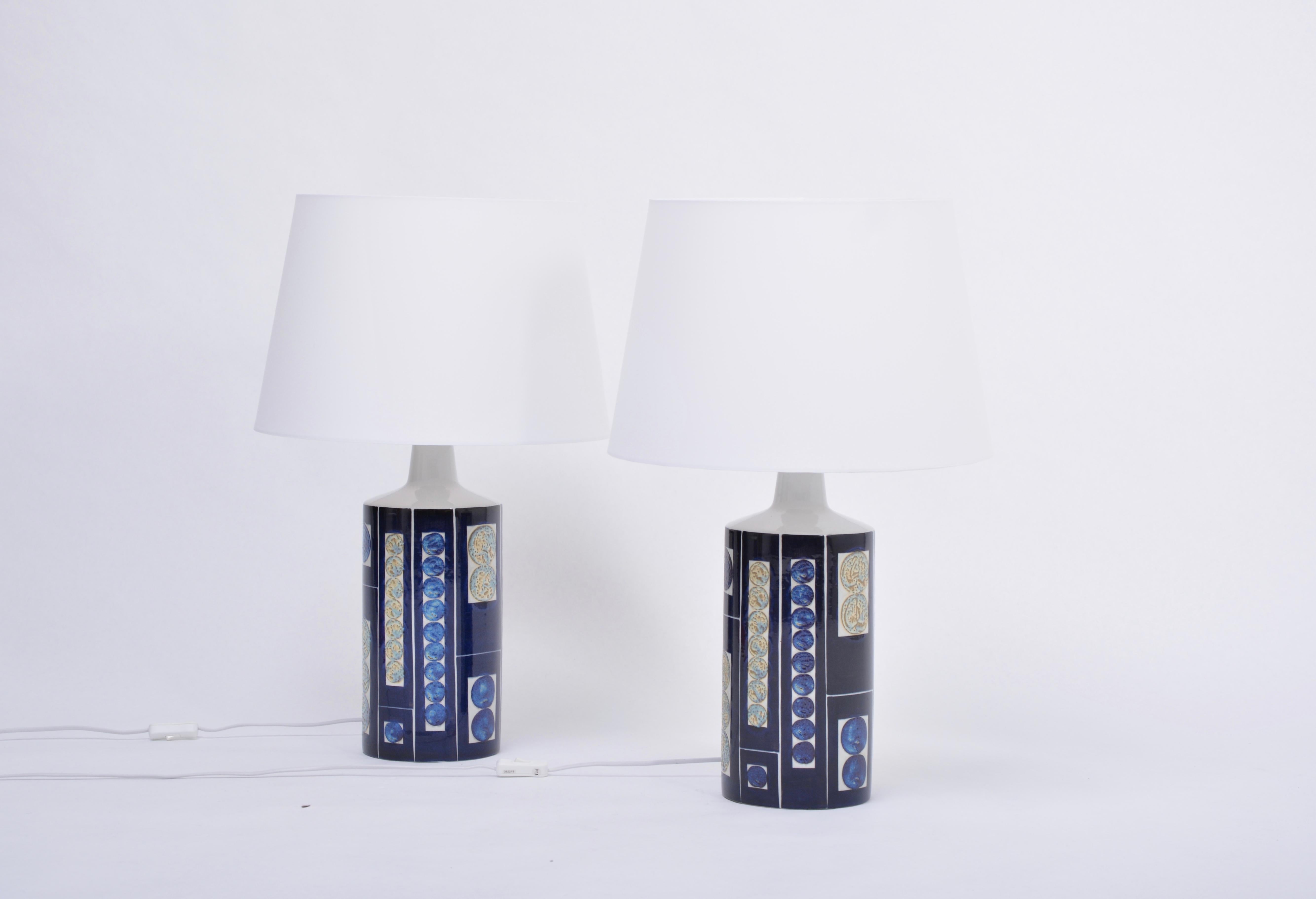 Pair of Blue Mid-Century Modern Royal 7 Tenera Table Lamps by Ingelise Koefoed for Fog & Mørup, 1967
Decorative table lamps with a gorgeous bold design in different tones of blue by Inge-Lise Koefoed for Aluminia/ Royal Copenhagen and produced by