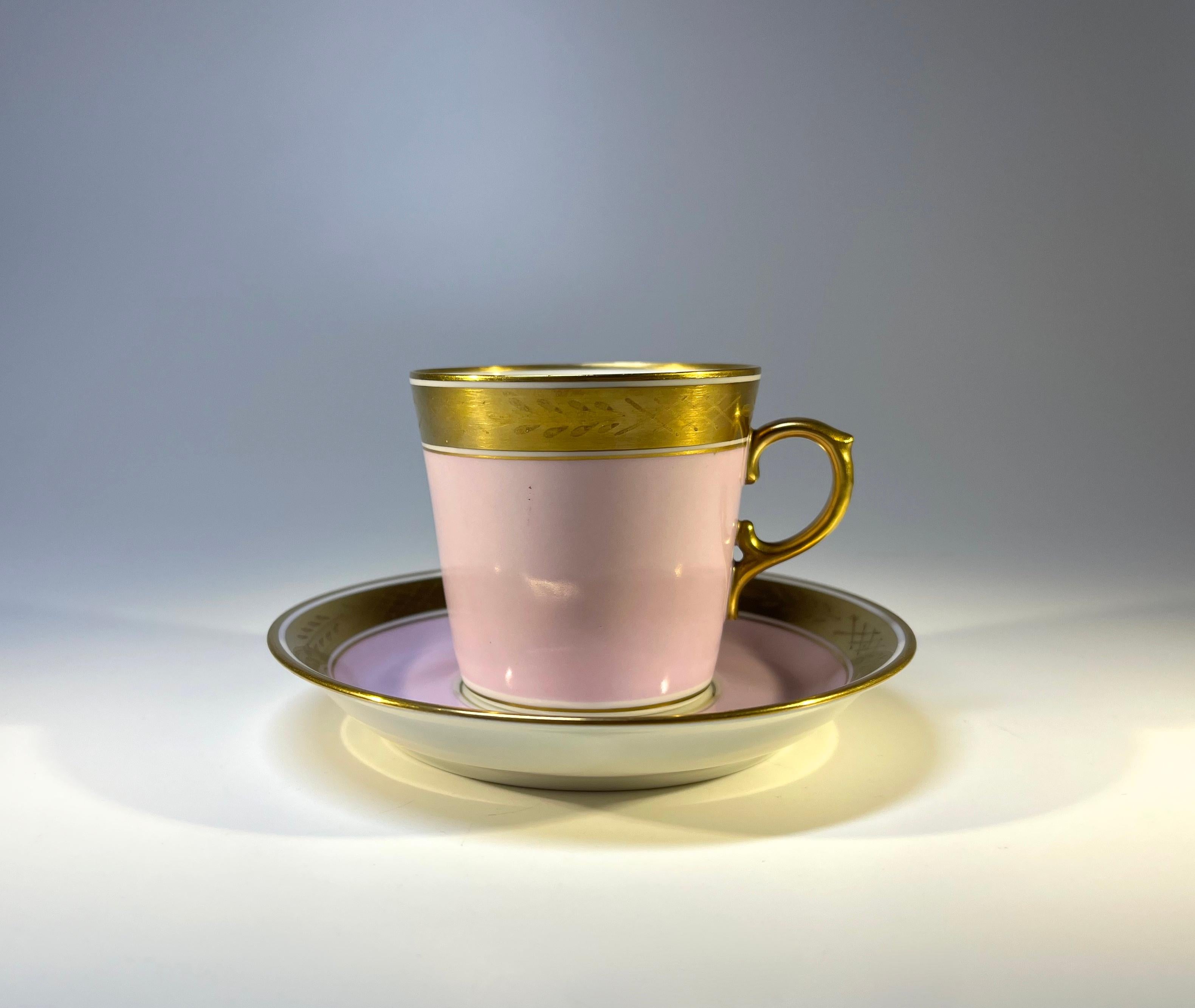 Delightful pair of bone china Royal Copenhagen demitasse cups and saucers
One a soft pale pink, the other crushed raspberry. Each decorated with broad gilded bands
Circa 1951
All pieces signed and numbered 9093
Height 2.15 inch, Diameter 2.30