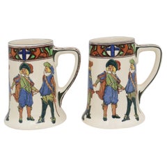 Pair of Royal Doulton New Cavaliers tankards or steins with pattern D4749