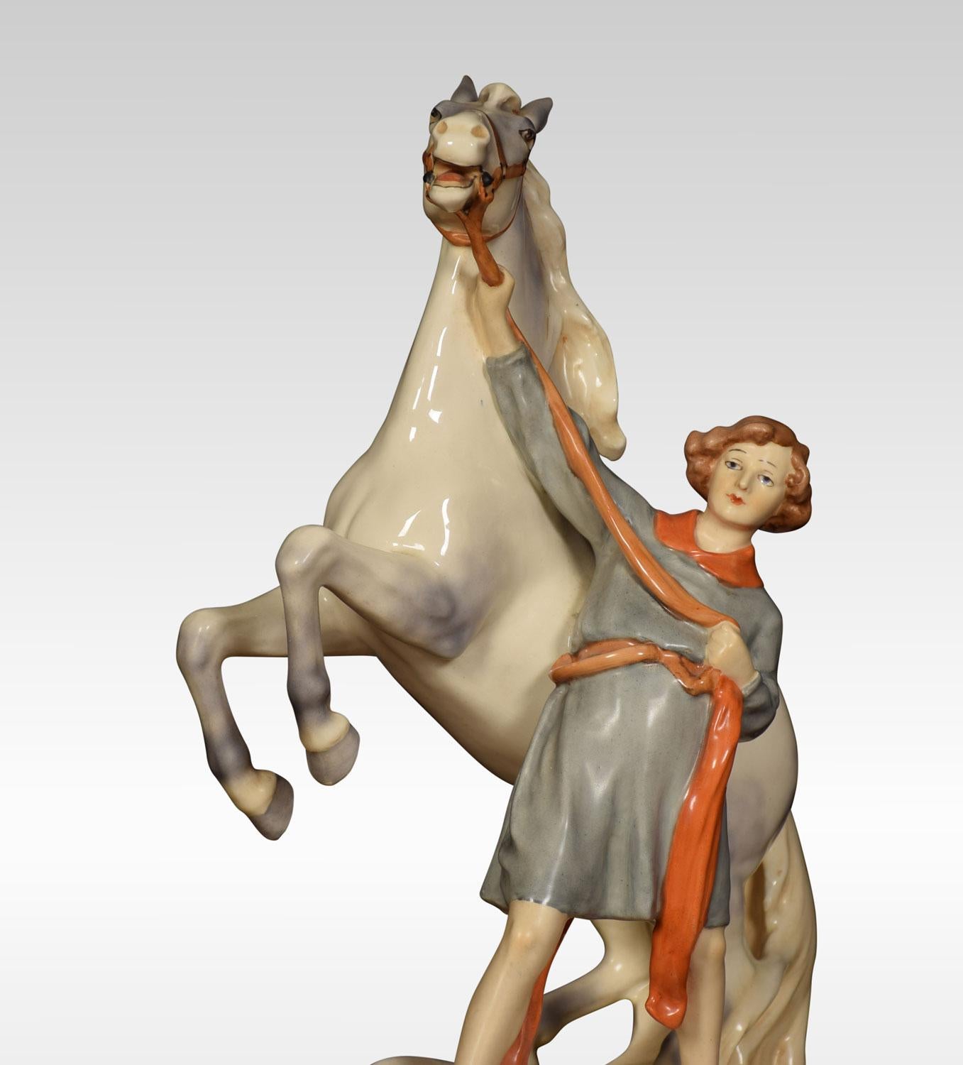 Porcelain Pair of Royal Dux Figure Groups of Young Men with Horses