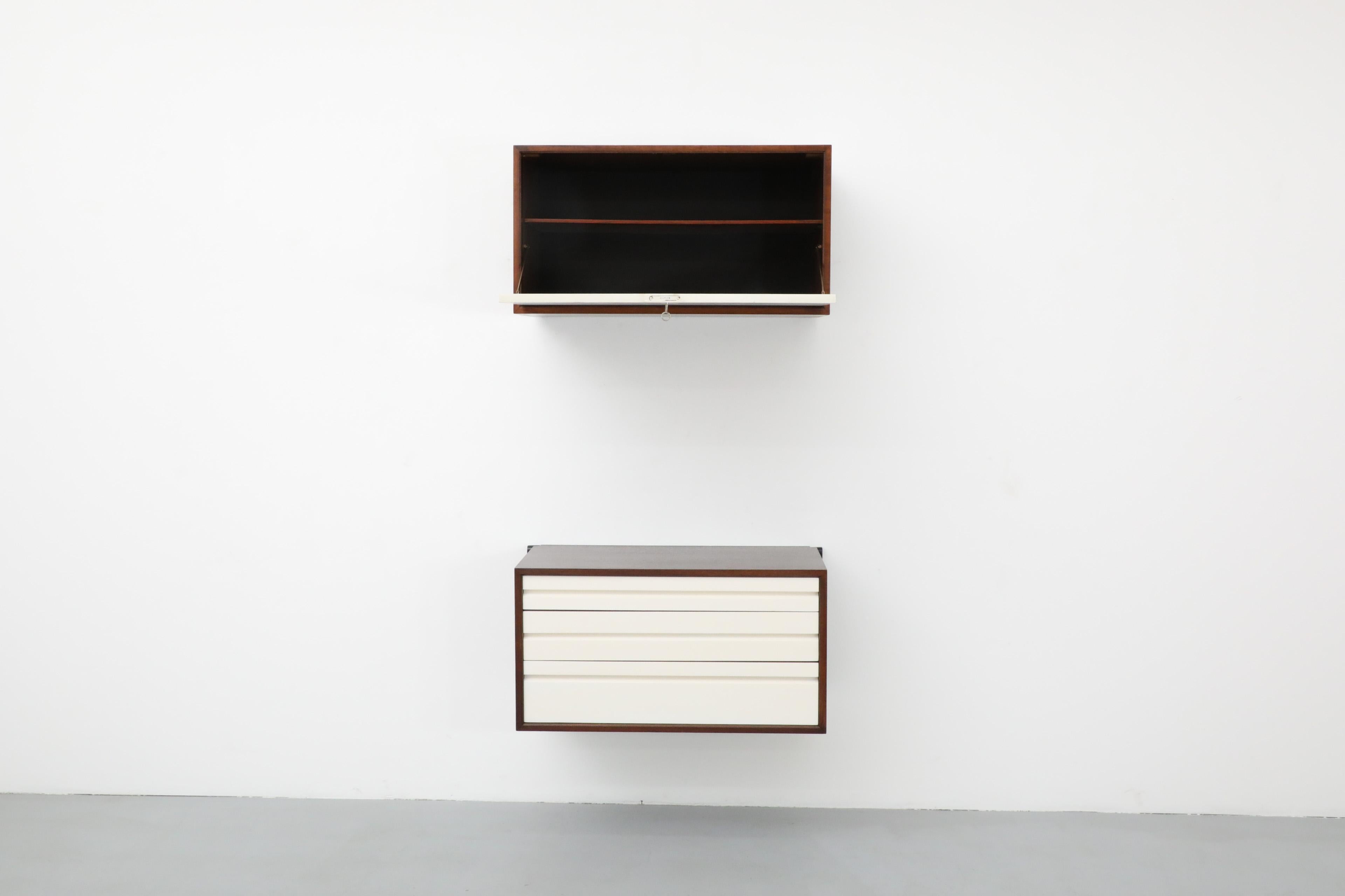 Mid-Century Modern Pair of Royal System Wall Mounted Cabinets by Poul Cadovius w/ Dark Teak Frames For Sale