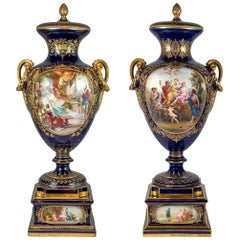 Pair of Royal Vienna Painted Porcelain Urn and Cover