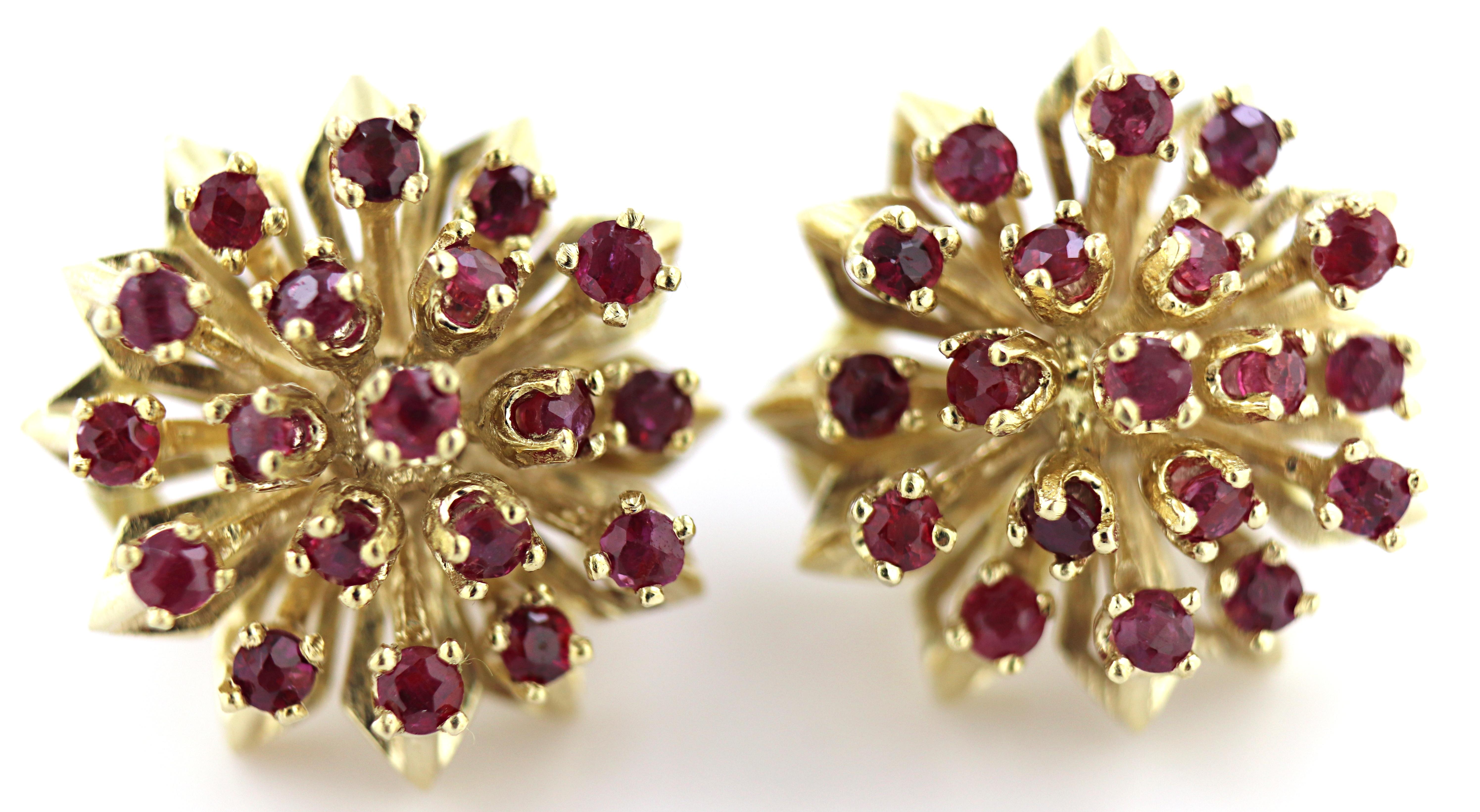 Featuring (38) round-cut rubies, 1.00 ct. tw., set in 14k yellow gold flower mountings, 18 mm, completed
by post and omega backs, marked 14ct., Gross weight 12.14 grams.