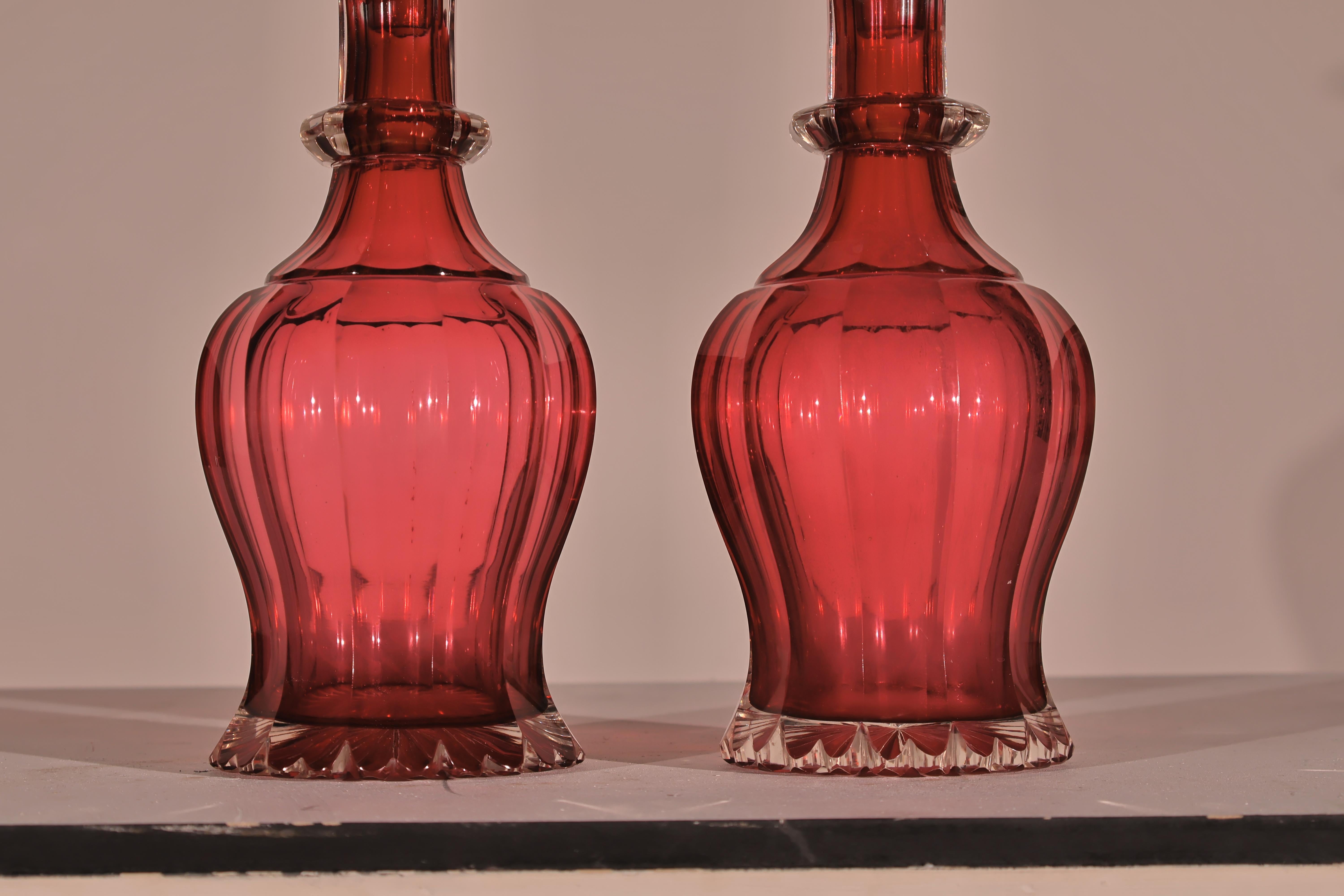 Neoclassical Pair of Ruby Decanters with Lids. For Sale