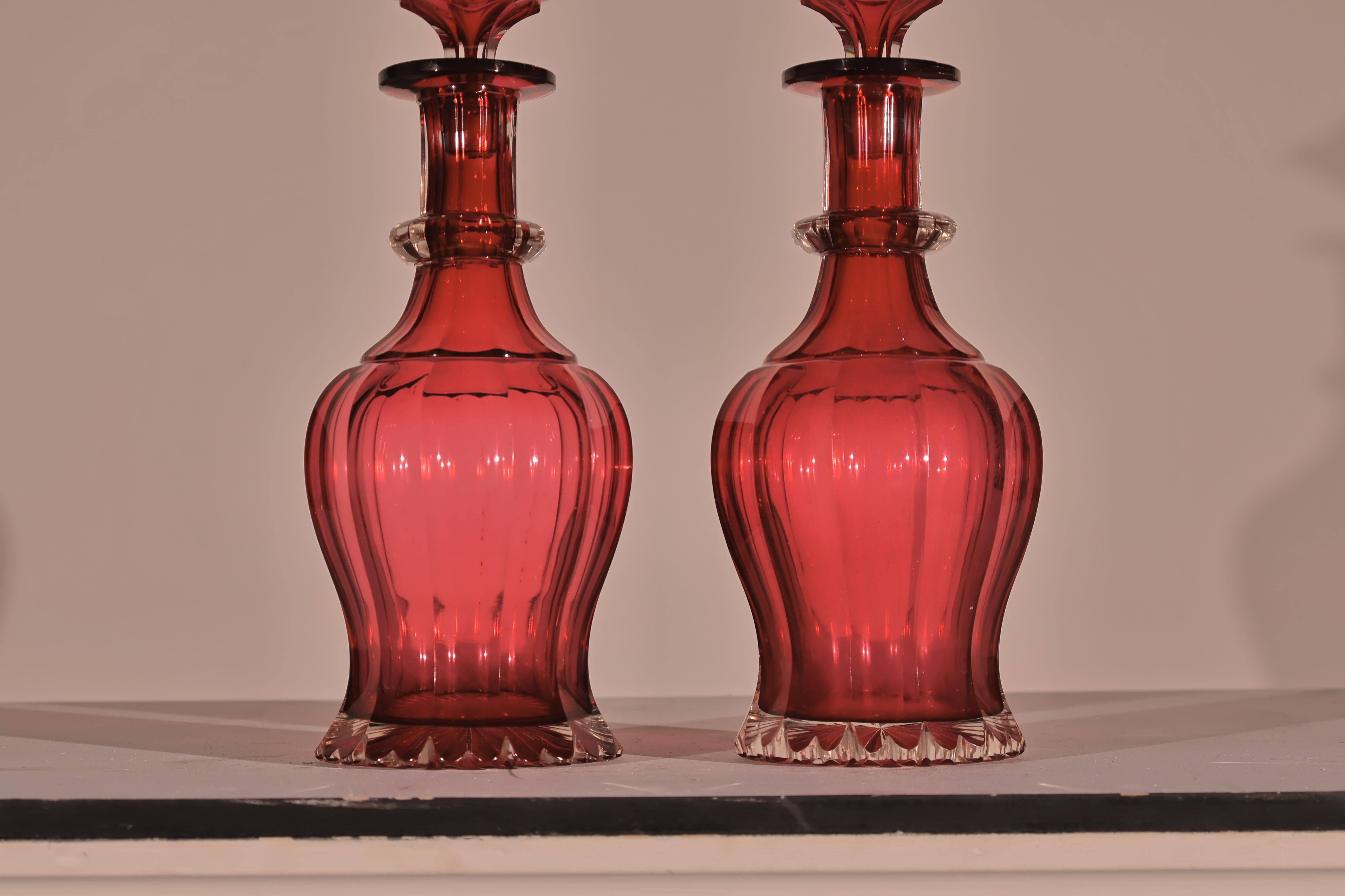Pair of Ruby Decanters with Lids. In Good Condition For Sale In Atlanta, GA