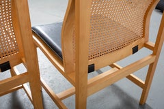 Pair of Rud Thygesen and Johnny Sorensen Cane Back Side Chairs