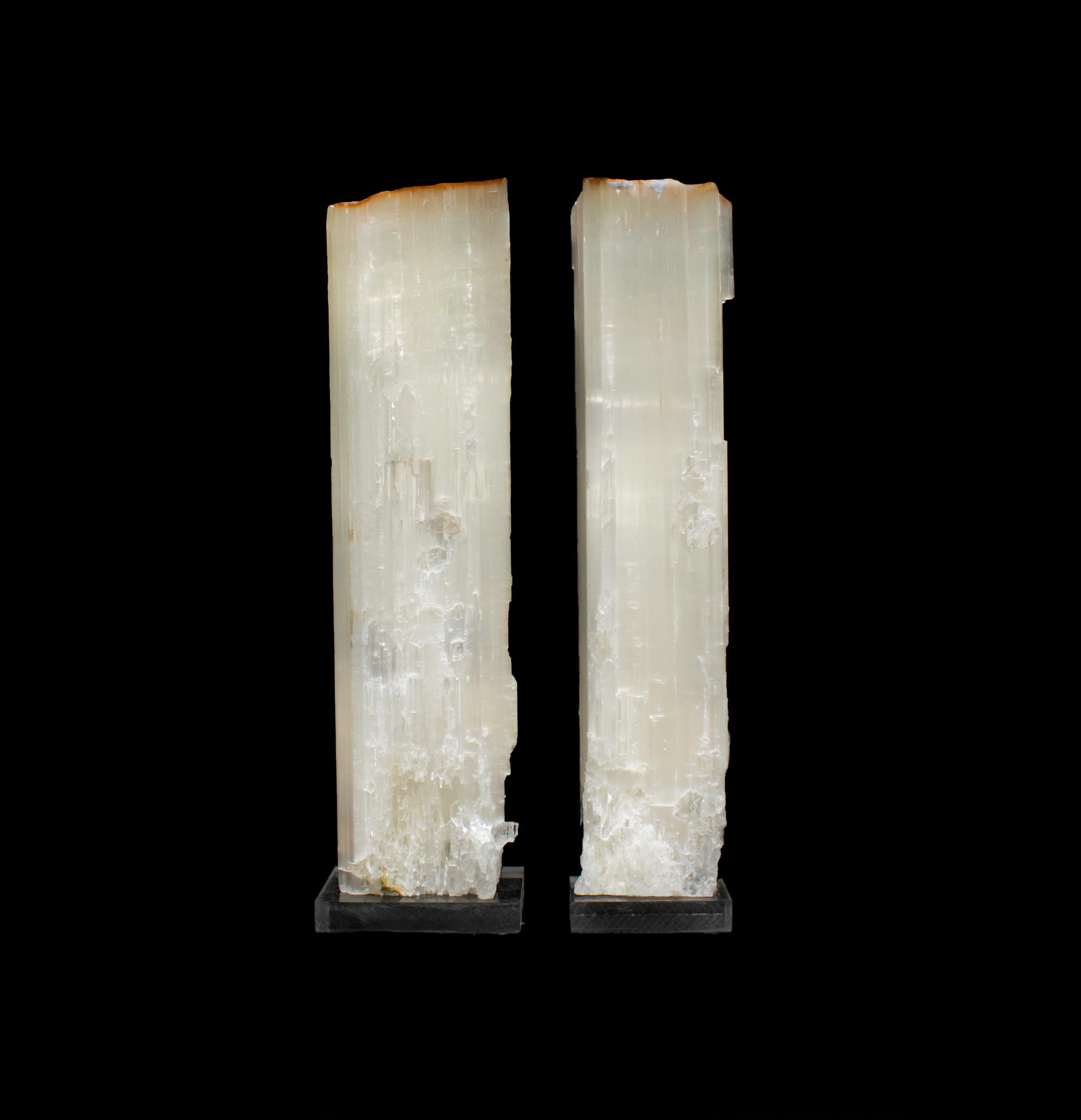 A pair of ruler selenite on lucite bases. Ruler selenite or 