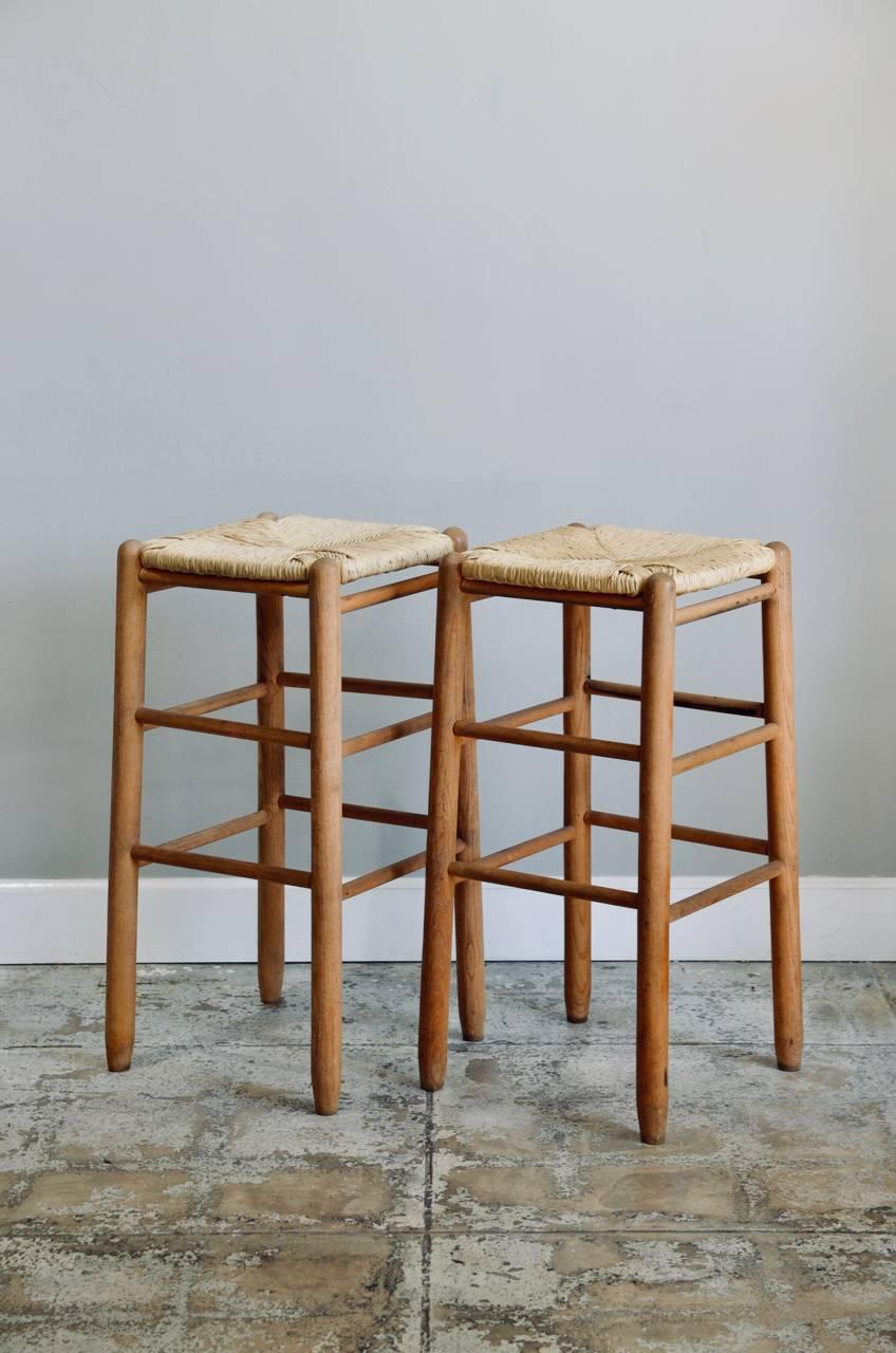 French Pair of Rush Bar Stools in the Style of Charlotte Perriand