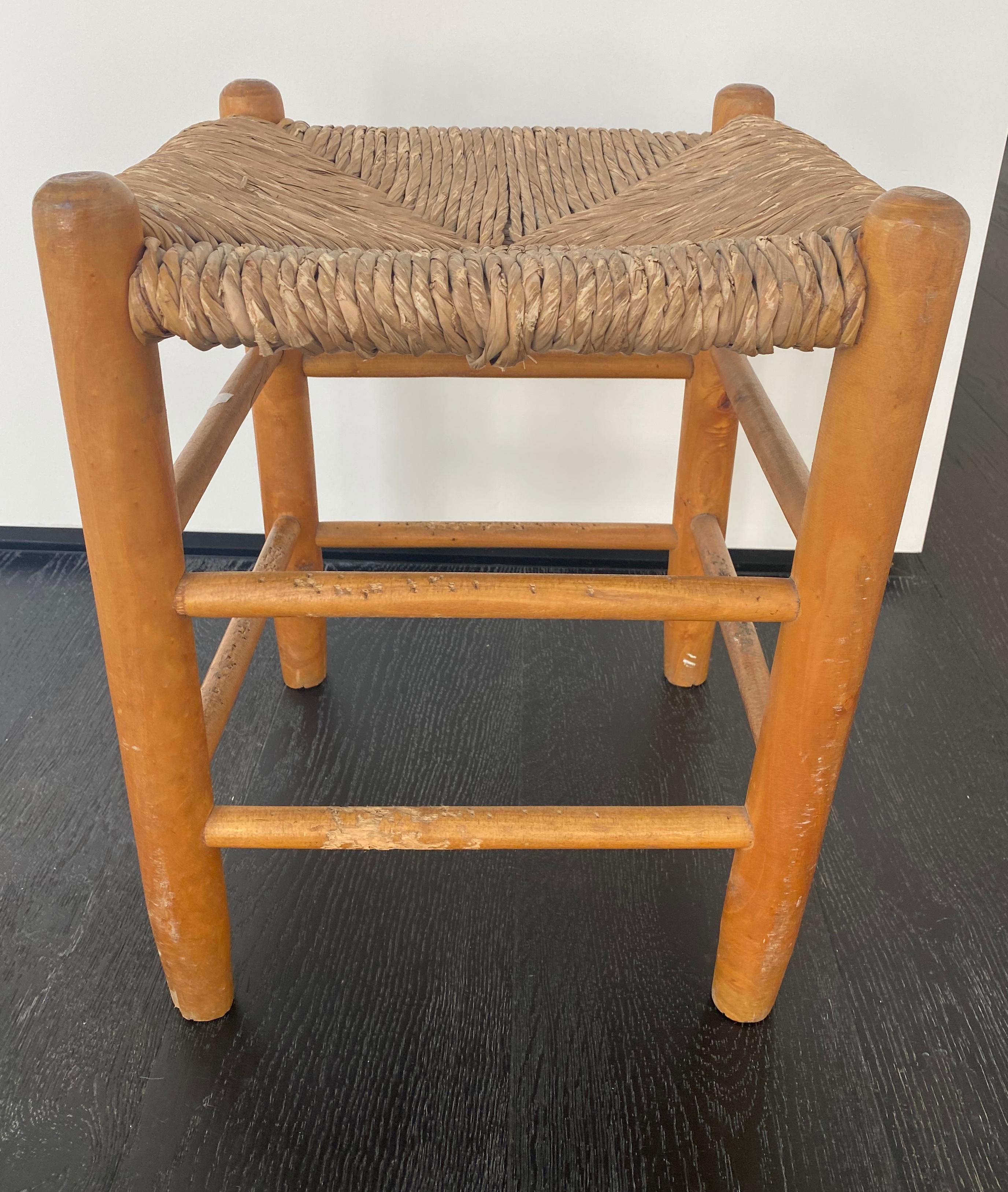 Pair of Wood and Straw Stools by Charlotte Perriand In Fair Condition For Sale In West Hollywood, CA