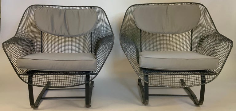 A pair of Classic vintage 1950's 'Sculptura' garden Lounge chairs by Russell Woodard. The most comfortable and desirable of Russell Woodard's Classic and iconic 'Sculptura' collection, the lounge chair is formed entirely of woven steel mesh, mounted