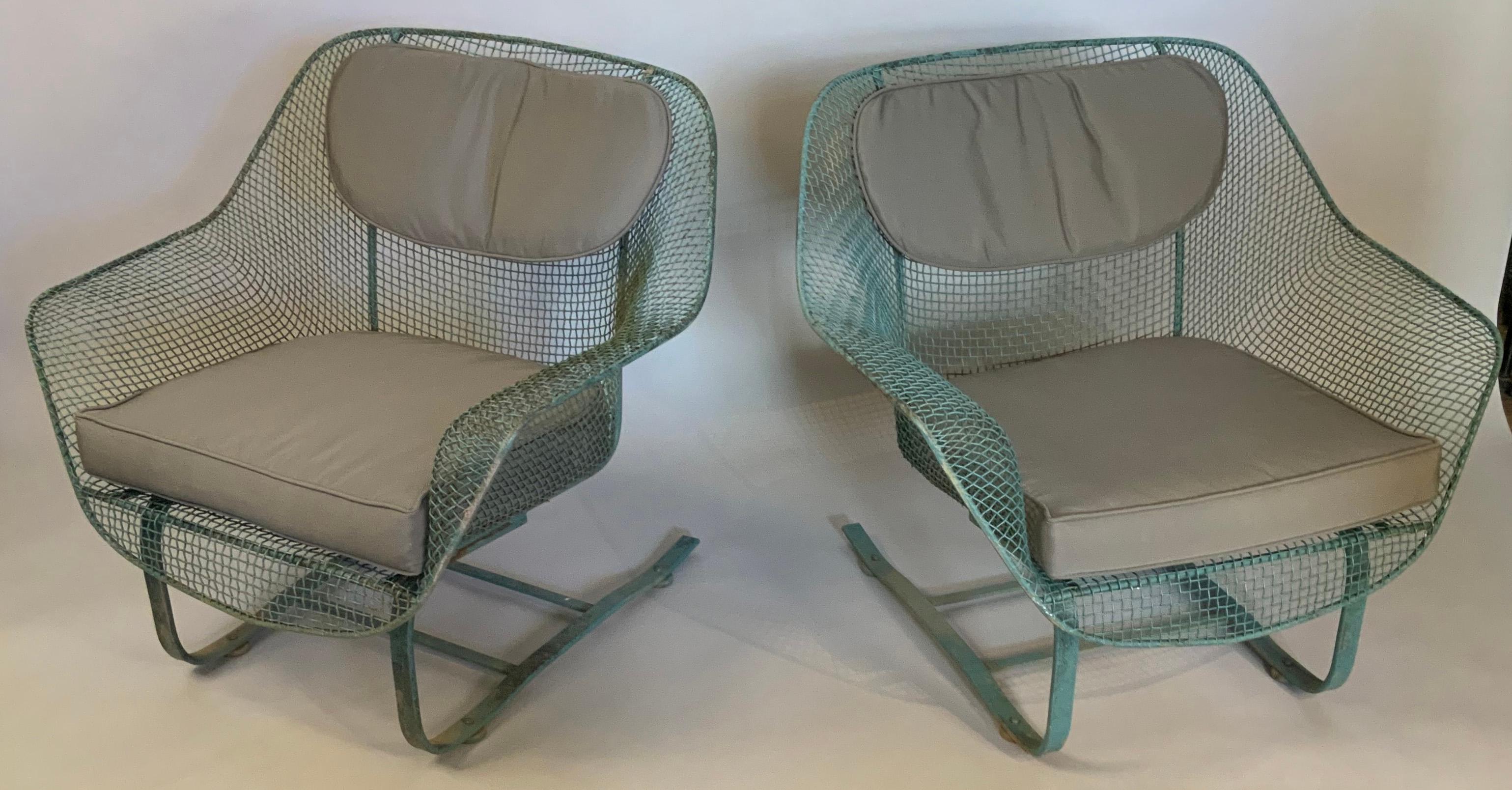 A pair of Classic vintage 1950s 'Sculptura' garden Lounge chairs by Russell Woodard. The most comfortable and desirable of Russell Woodard's Classic and iconic 'Sculptura' collection, the lounge chair is formed entirely of woven steel mesh, mounted