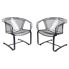Pair of Russell Woodard Black Barrel Spring Rocker Lounge Chairs, 1950s