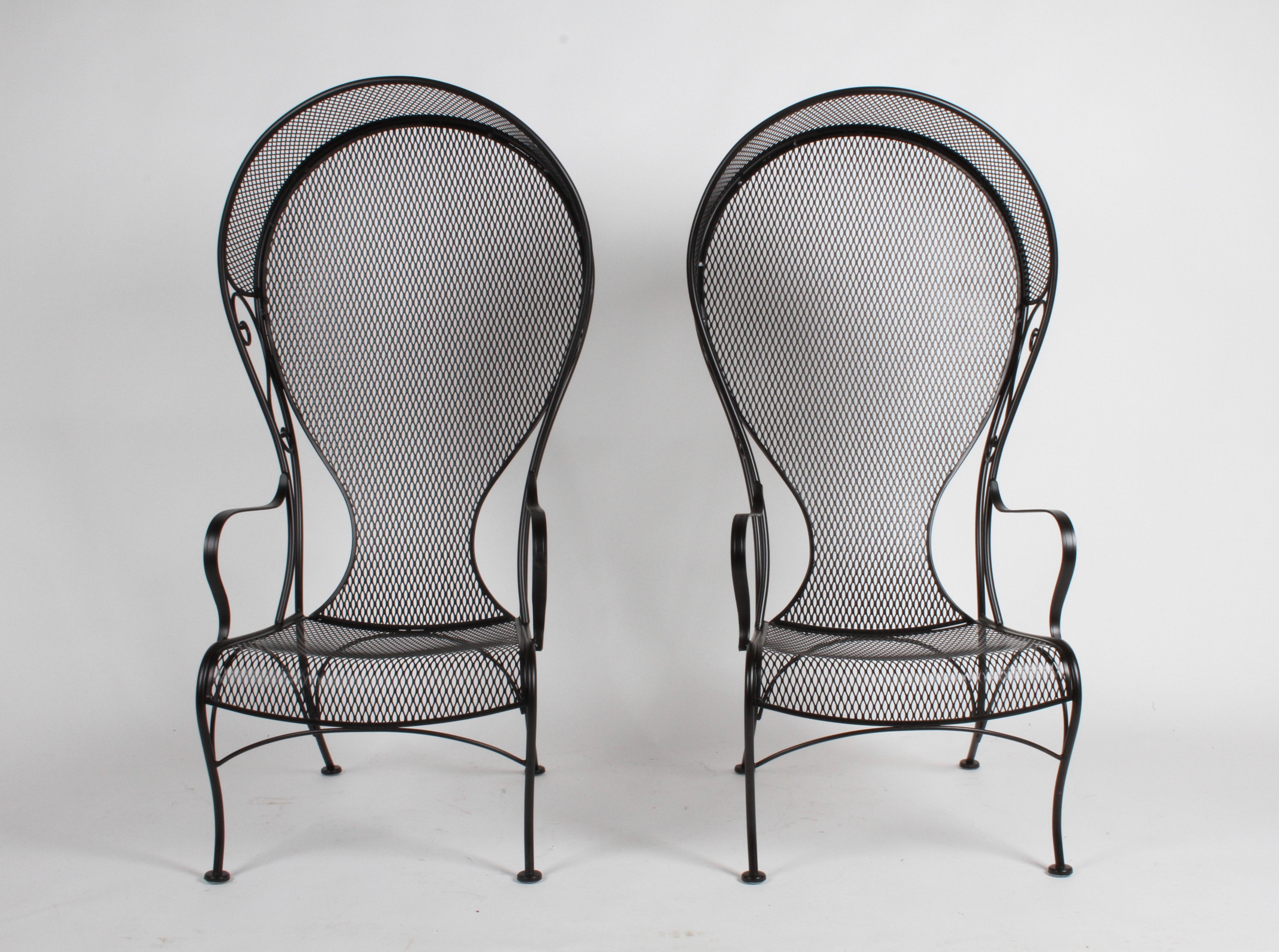 A rare set of Mid-Century Modern Russell Woodard wrought iron high back canopy patio lounge chairs with corseted backs, also know as the Princess chair in satin black. These chairs have been blasted, dipped in rust prohibitor and painted in stain