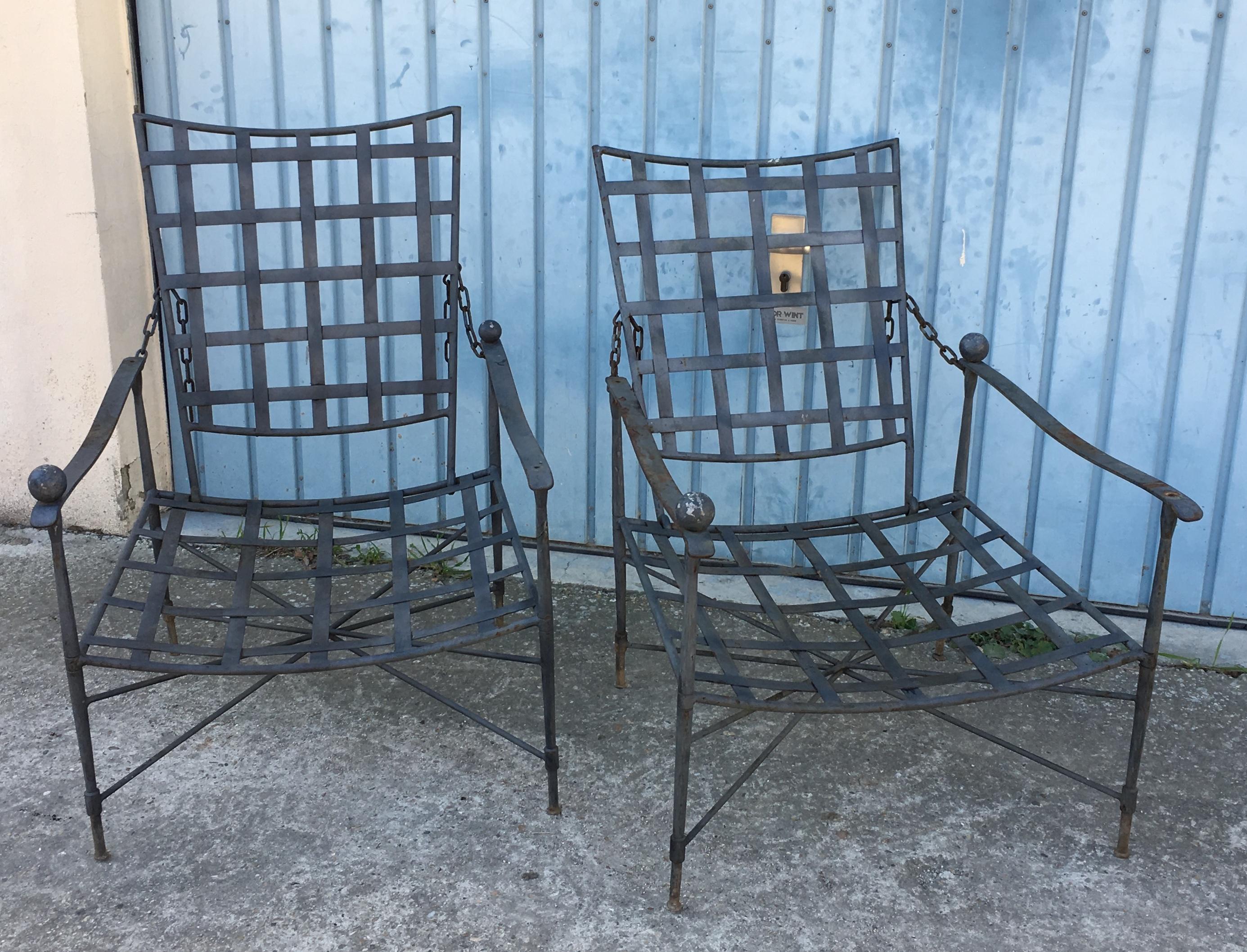 Pair of adjustable Mario Papperzini for Salerini midcentury lounge chairs with one side table.

Gorgeous blue green patina. Very good quality garden furniture, made in the USA in the early 1900s.
 
