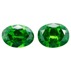 Pair of Russian Demantoid Garnets with horsetail inclusion 0.59 ct weight