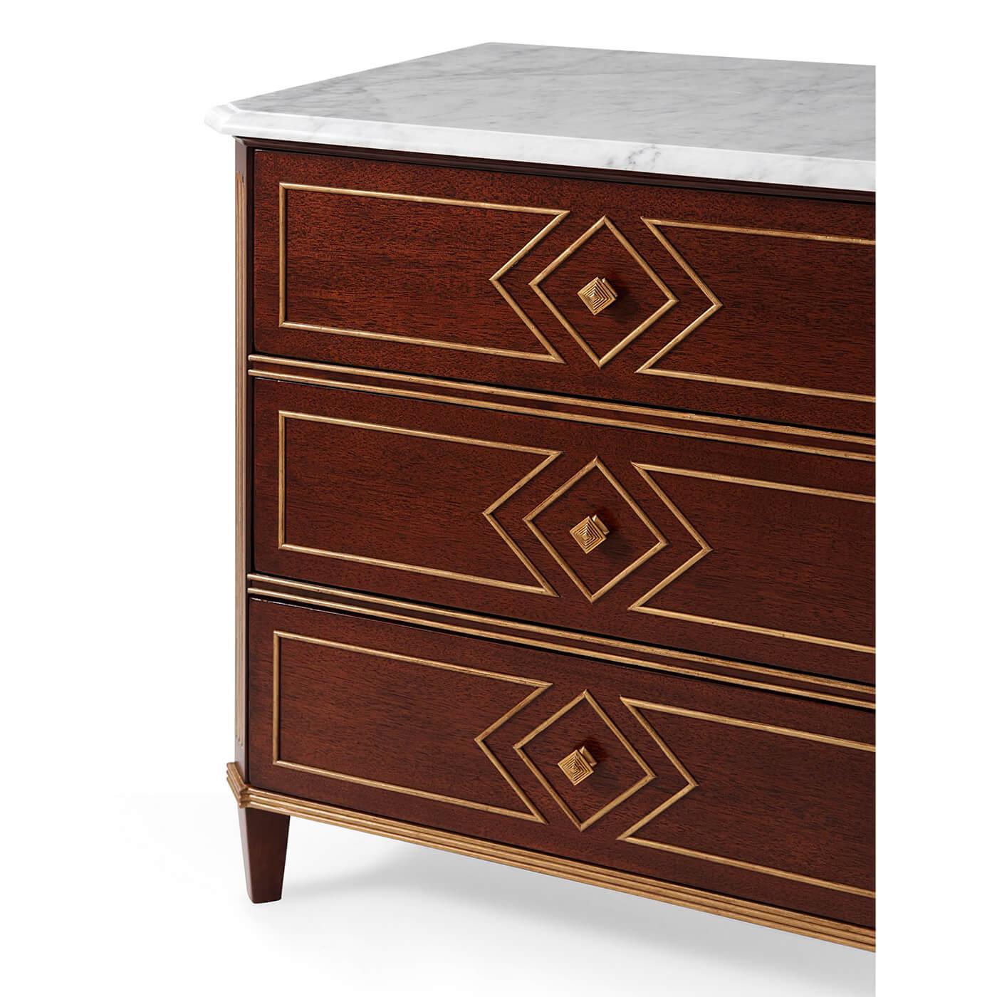 Russian neoclassic style nightstand with a molded edge Carrara marble top, mahogany side with geometric and diamond faceted paneling, with gilt fluted canted corners and raised on square tapered legs.

Dimensions: 28