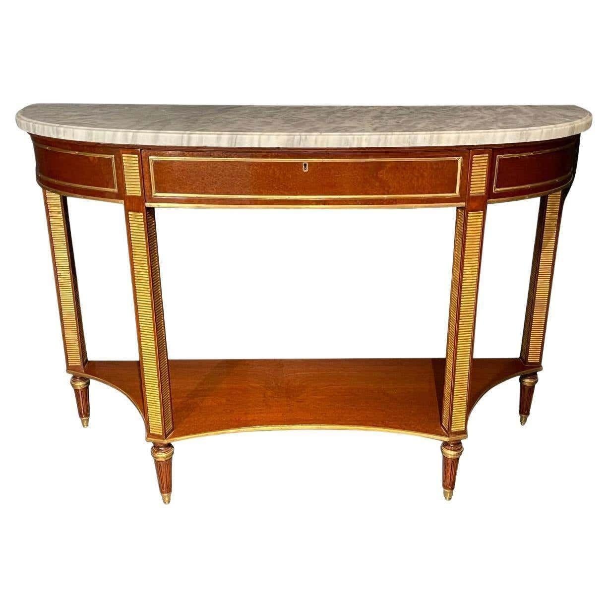 Russian neoclassical demilune marble top console, sideboard or sofa table having a tortoiseshell Veneer Finish. This stunning and sleek console is bronze mounted throughout having a thick Carrara white and gray veined marble top supported by a