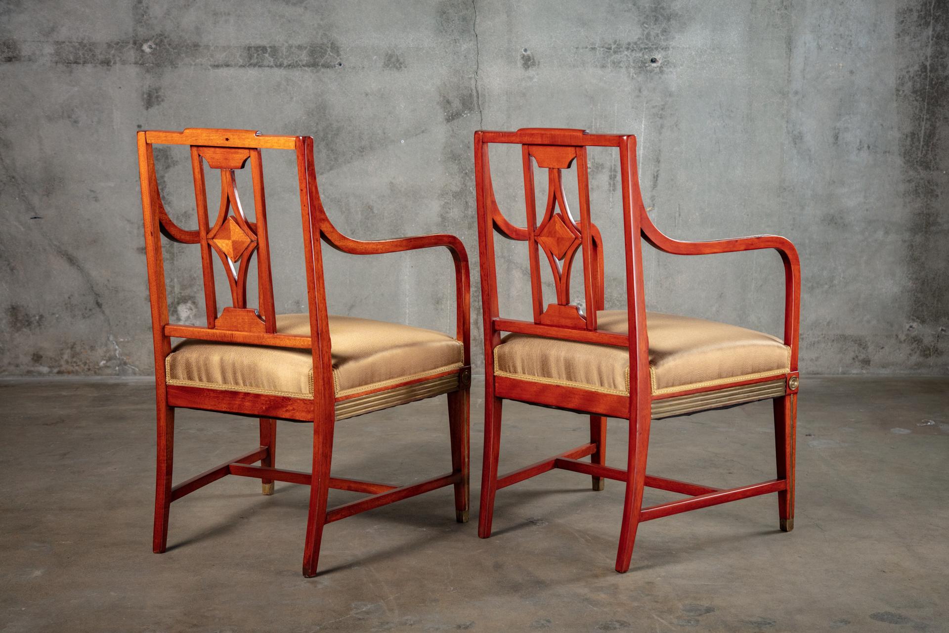 Pair of Russian neoclassical brass-mounted mahogany armchair, 19th century.