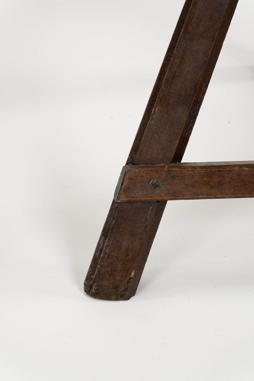 Pair of rustic Alpine chairs, or backed stools, circa 1840-1869. Hand-carved in mixed woods. Decorative pierced walnut backs. Sold together as a near pair priced $5,800.
1st chair: 37.75 inches high x 22.5 inches wide x 22 inches deep (seat is 18.5