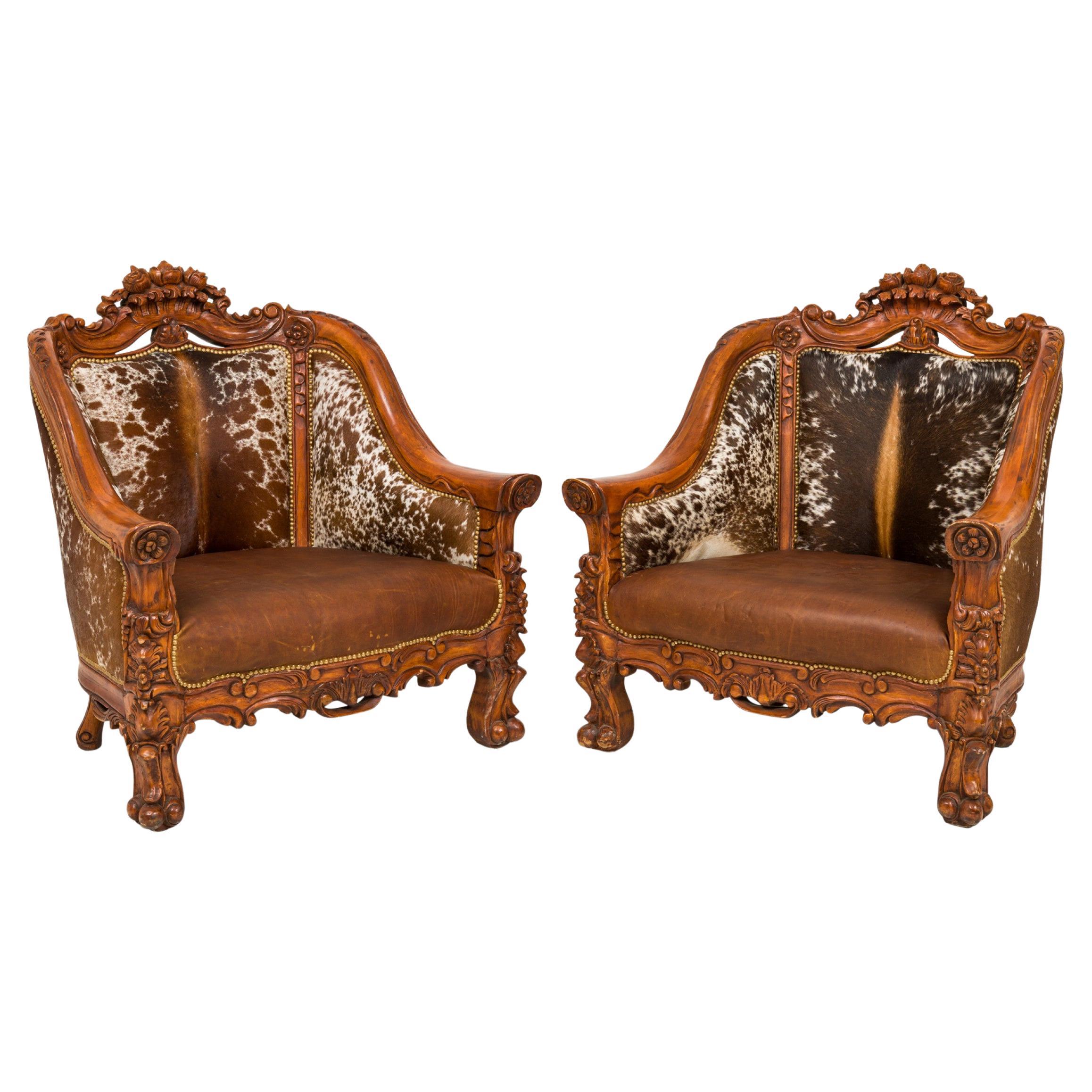 Pair of Rustic American Carved Walnut and Cowhide Wide Lounge / Armchairs For Sale