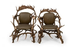 Pair of Rustic Continental Style Olive Green Leather and Faux Antler Armchairs