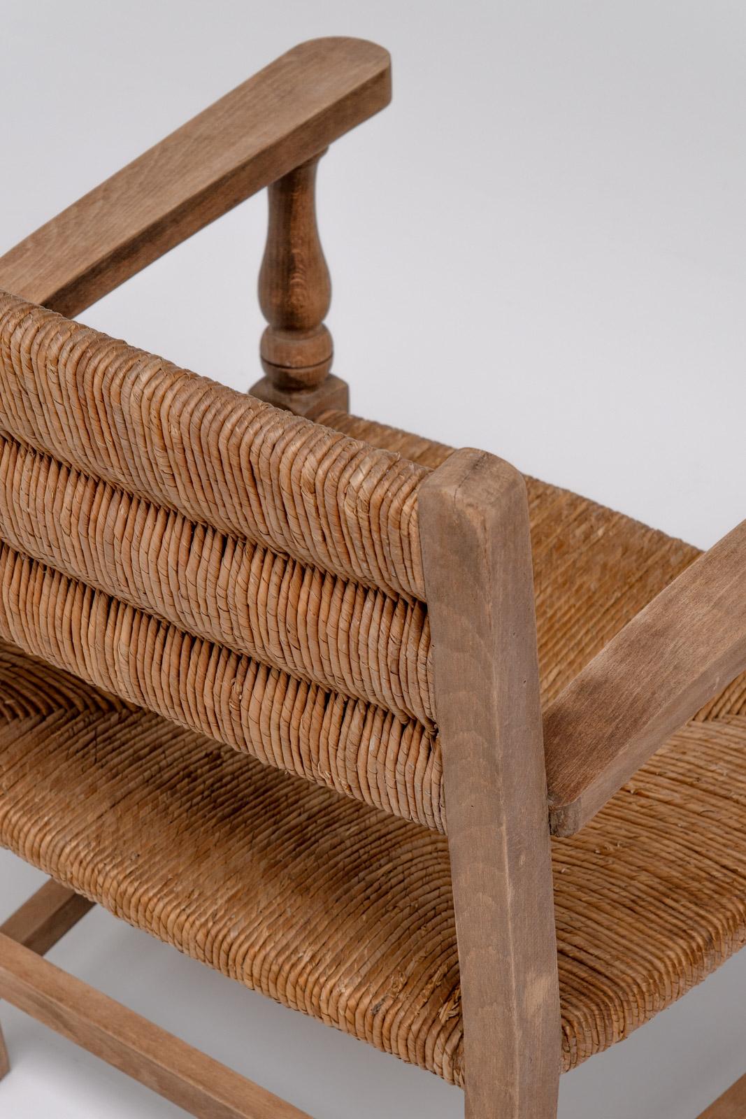 Rustique Paire de fauteuils rustiques en chêne et jonc, années 1950 en vente