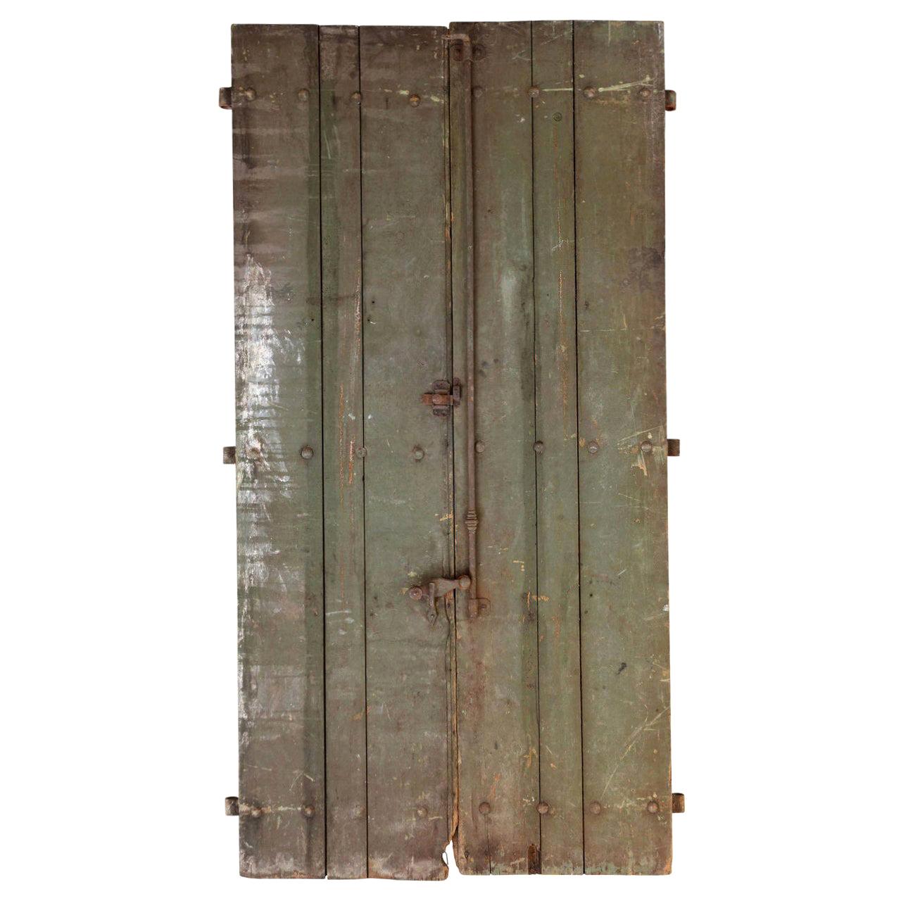 Pair of Rustic Green Painted Spanish Shutters For Sale