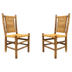 Pair of Rustic Hickory Side Chairs with Cane Seats