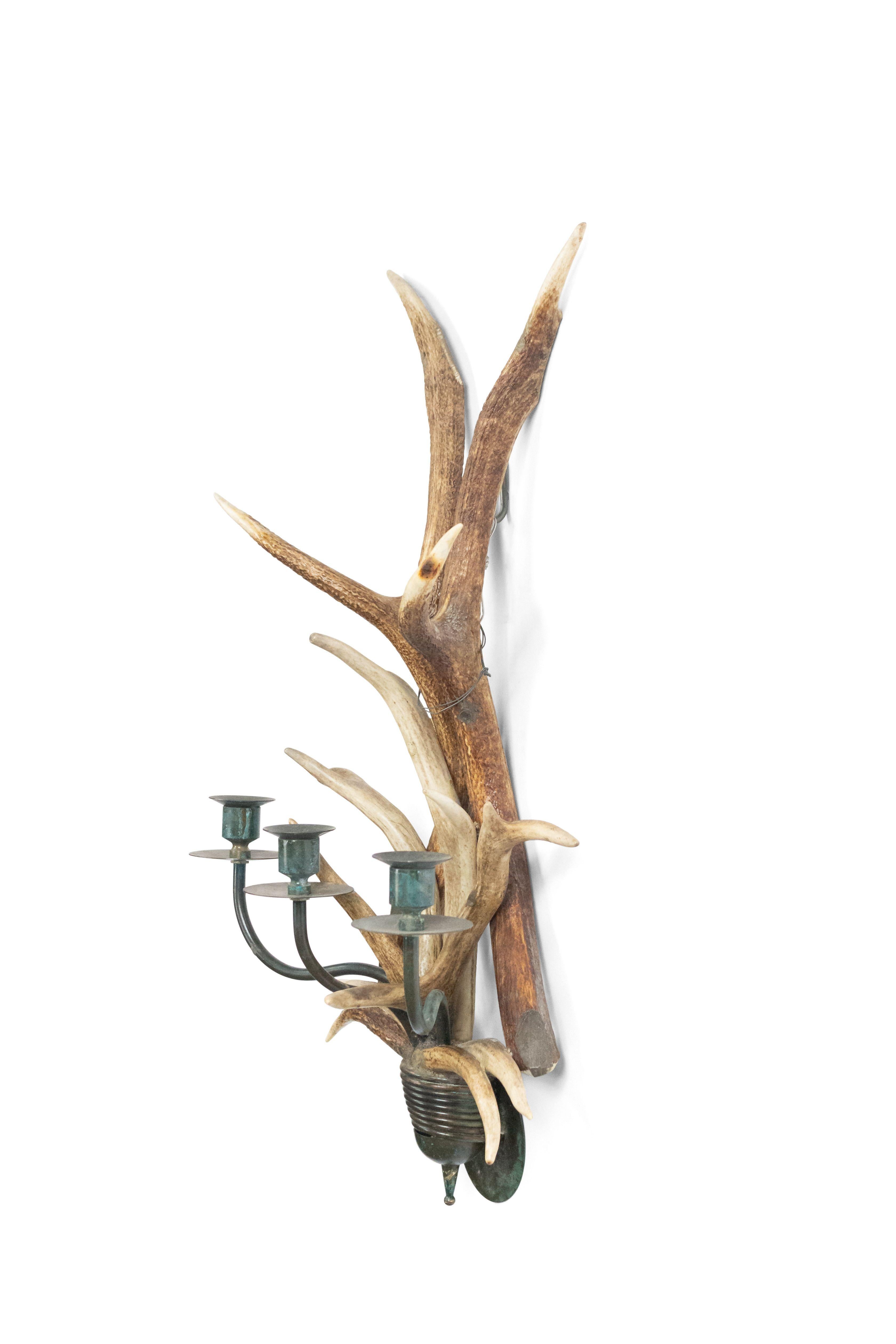 PAIR of Rustic-style horn and patinated brass wall sconces with three arms. (priced as pair).