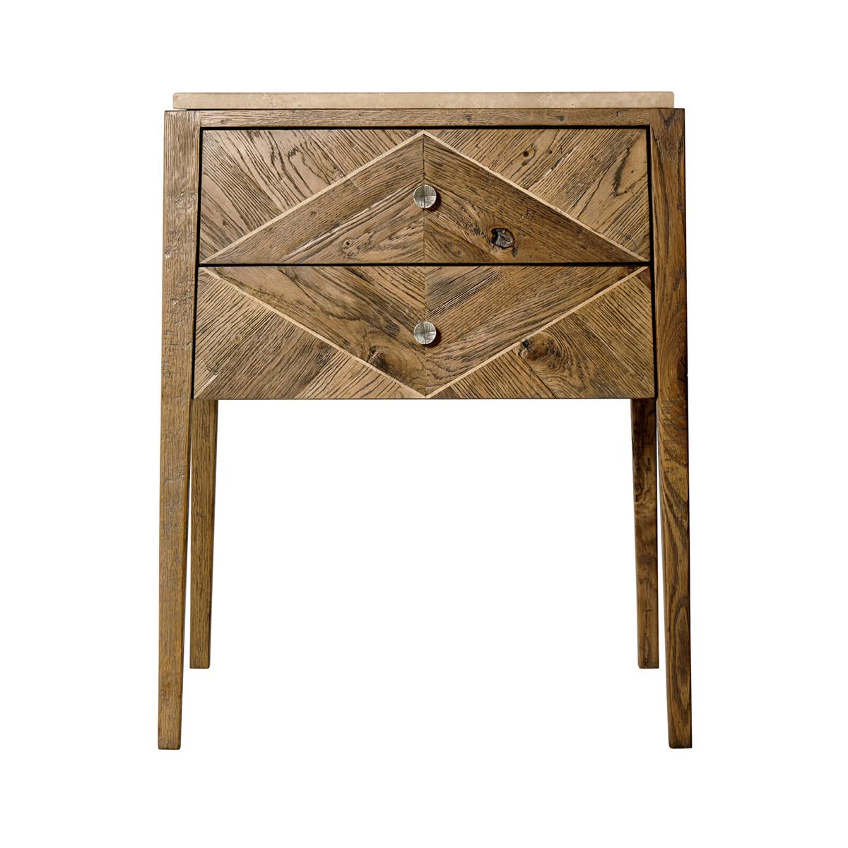 Rustic oak parquetry bedside table with a honed travertine top, oak chevron parquetry decoration in our echoe oak finish with two drawers and textured 'vintage' metal handles on square tapered splayed legs.

Dimensions: 23.5
