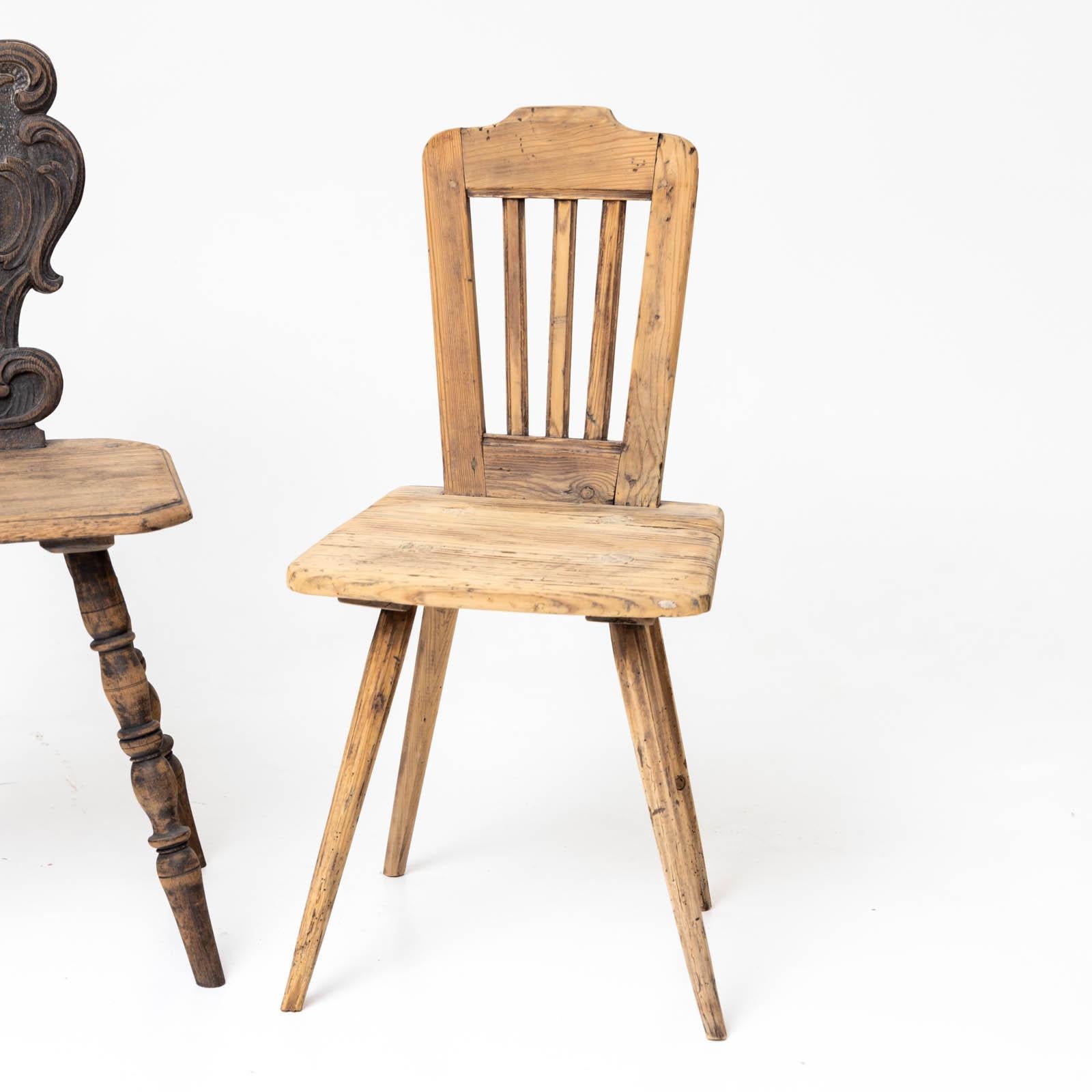 Carved Pair of rustic softwood chairs, 19th century For Sale